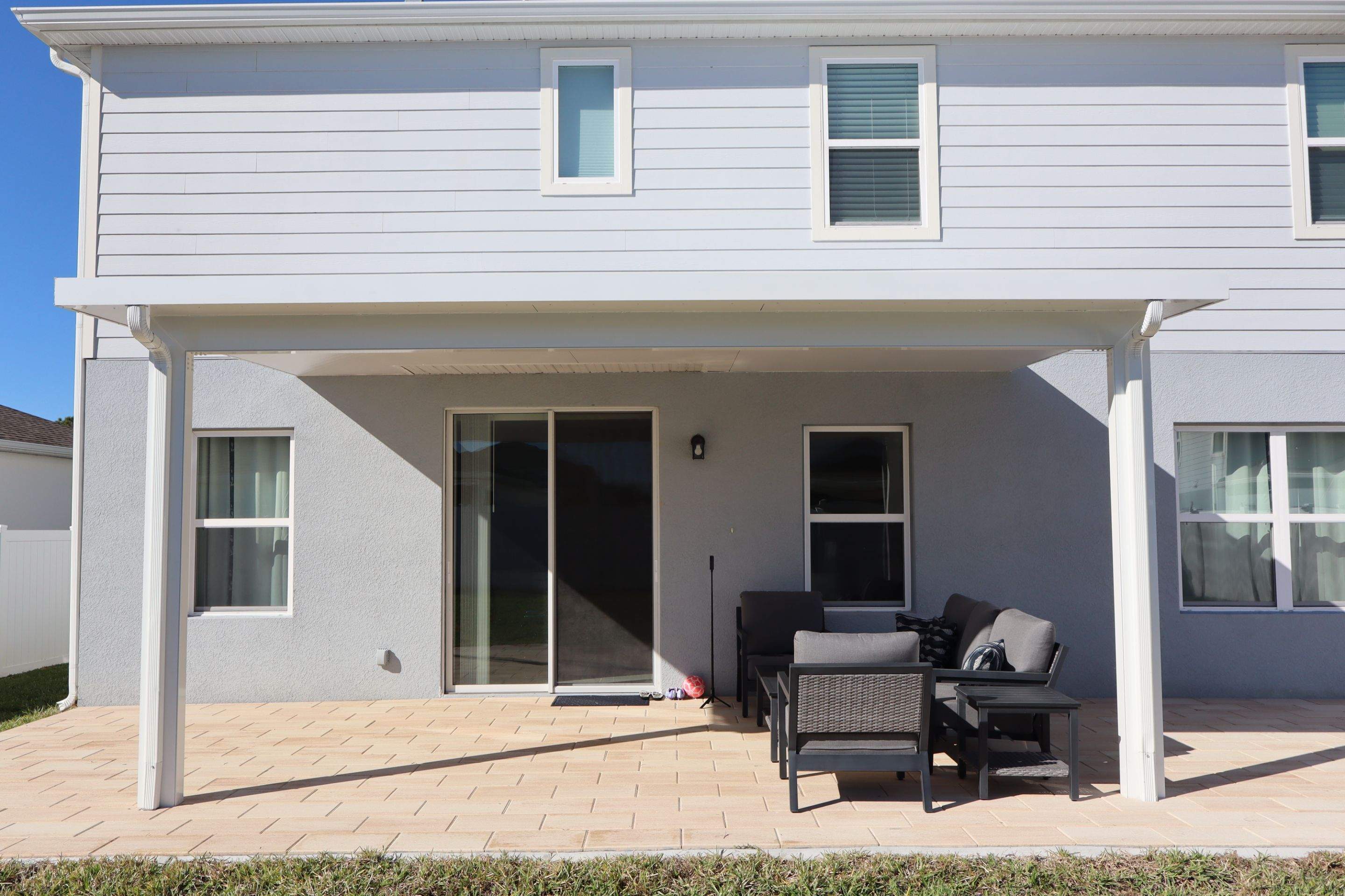 Patio cover and pavers  using Aluminum  by Orlando pergolas 