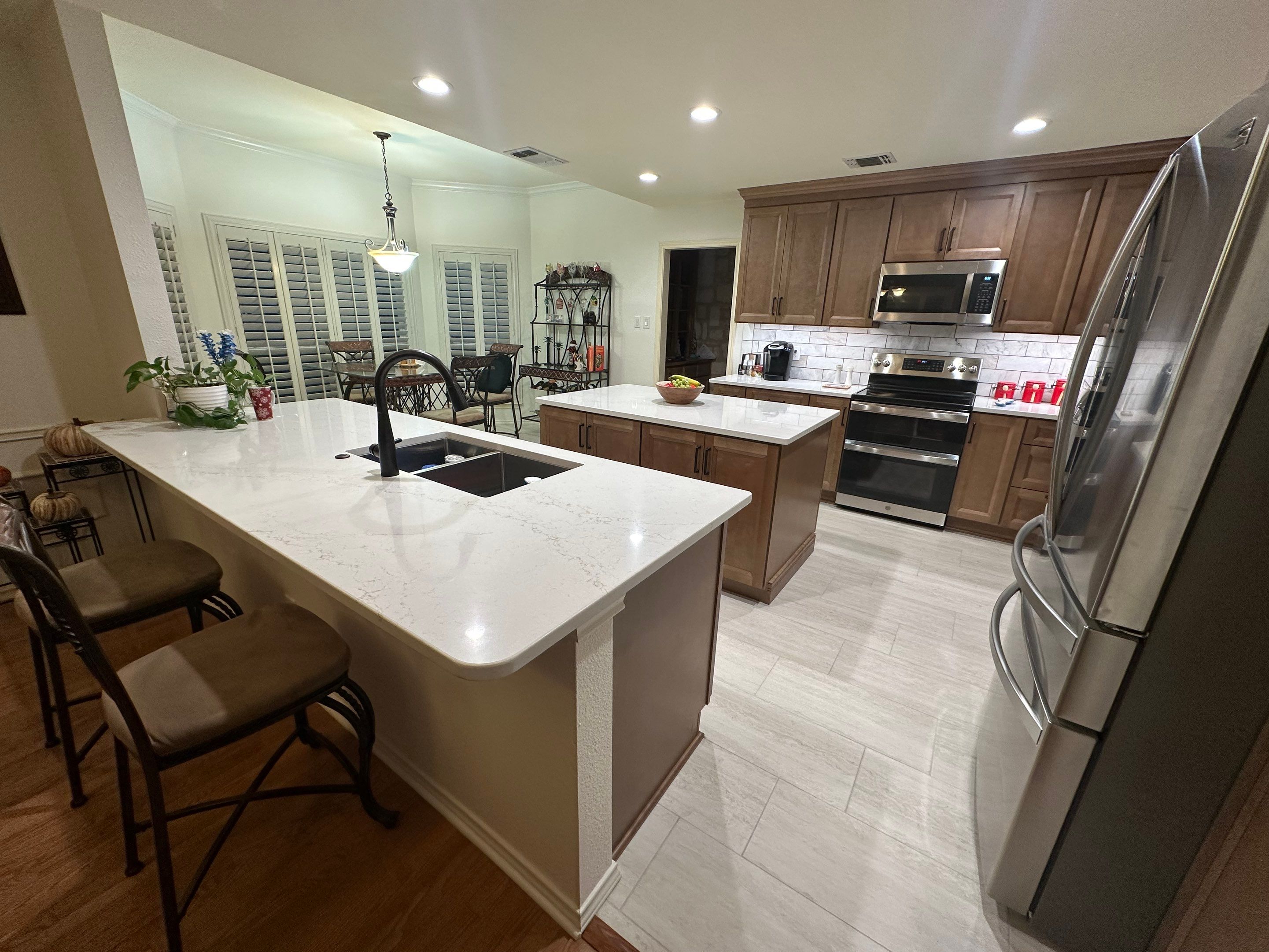 Stone Oak Kitchen Remodel Removing Wall to Expand Space by Legacy Bath and Kitchen 