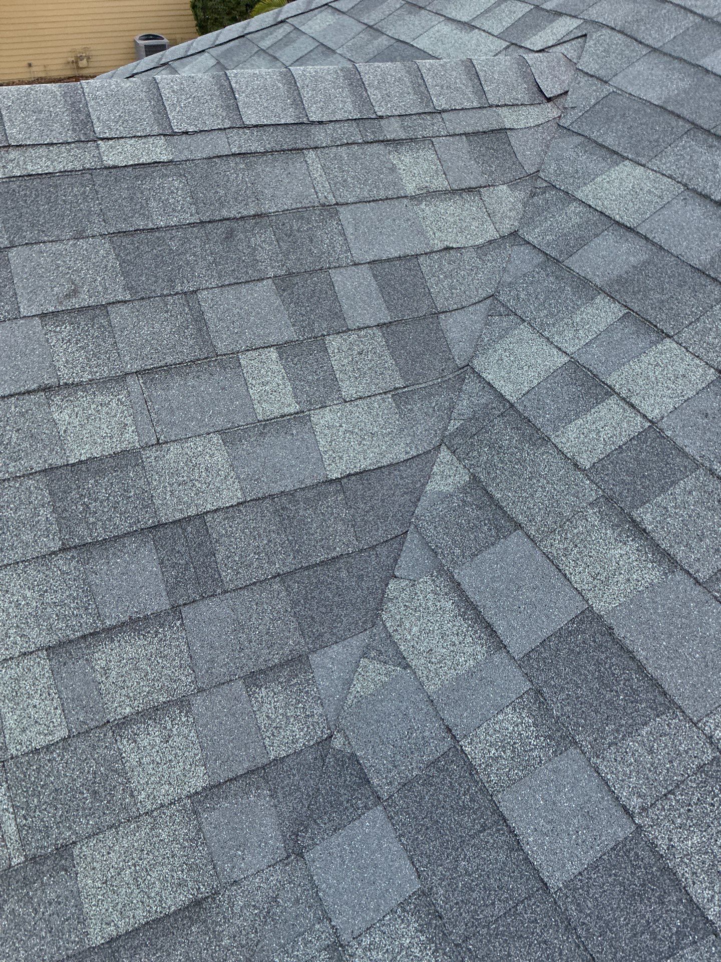 Reroofing hail damage in Gainesville, FL by Brehm Roofing
