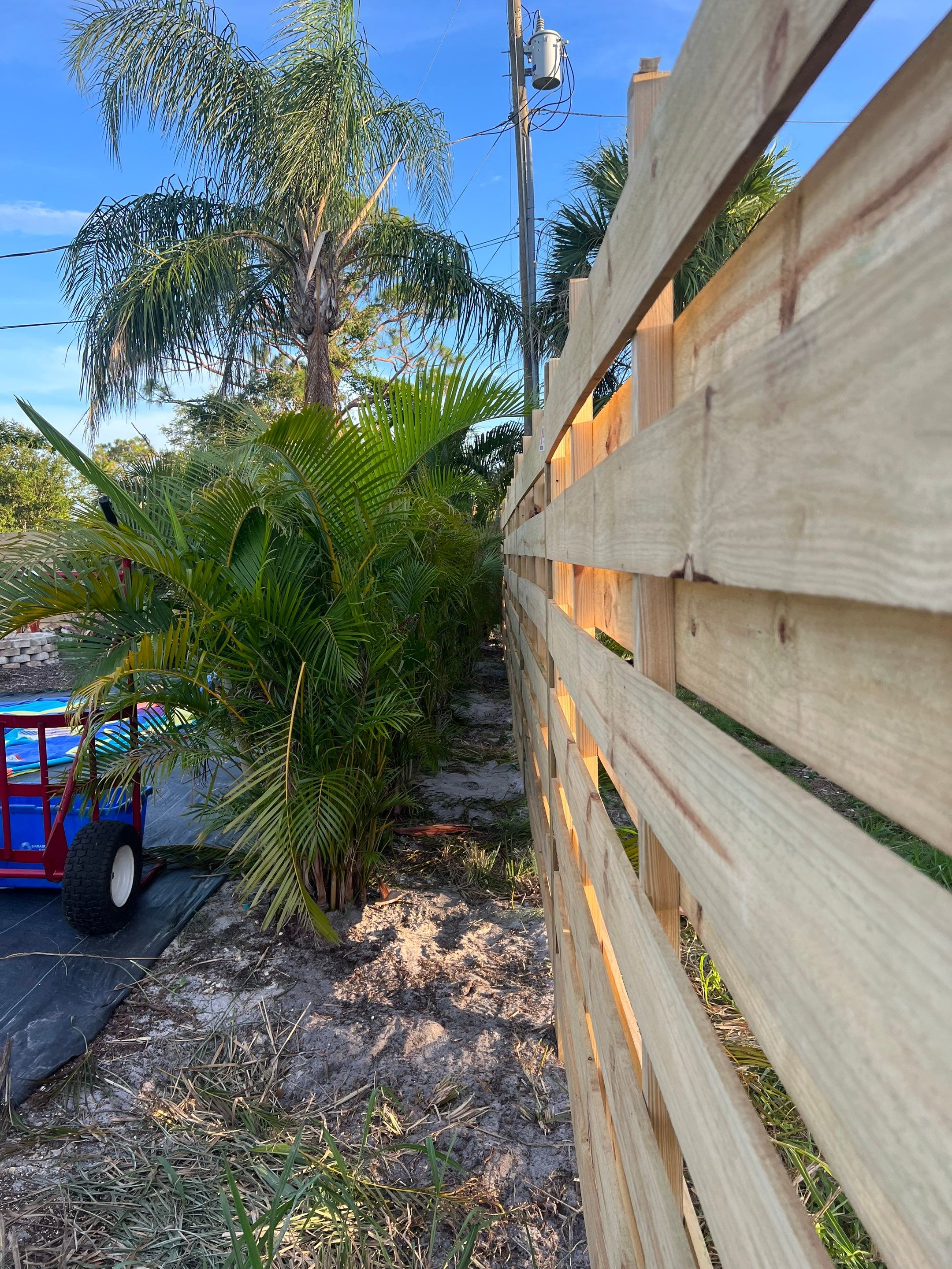 Wood Fence Installation using Horizontal Shadowbox Wood Privacy Fence by Asap fence and gates, LLC