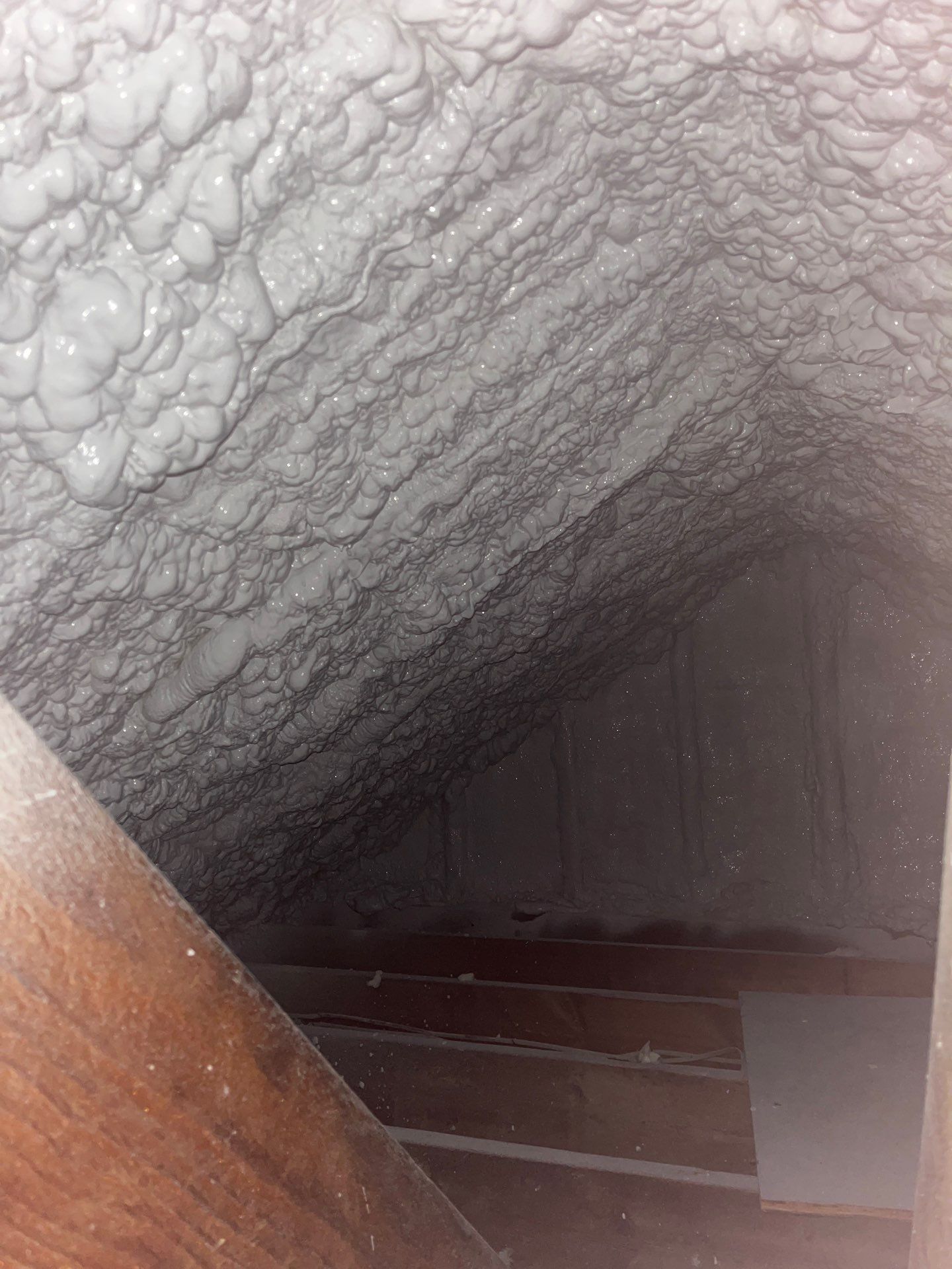 Attic Retrofit using open cell spray foam by NYS Foam & Energy