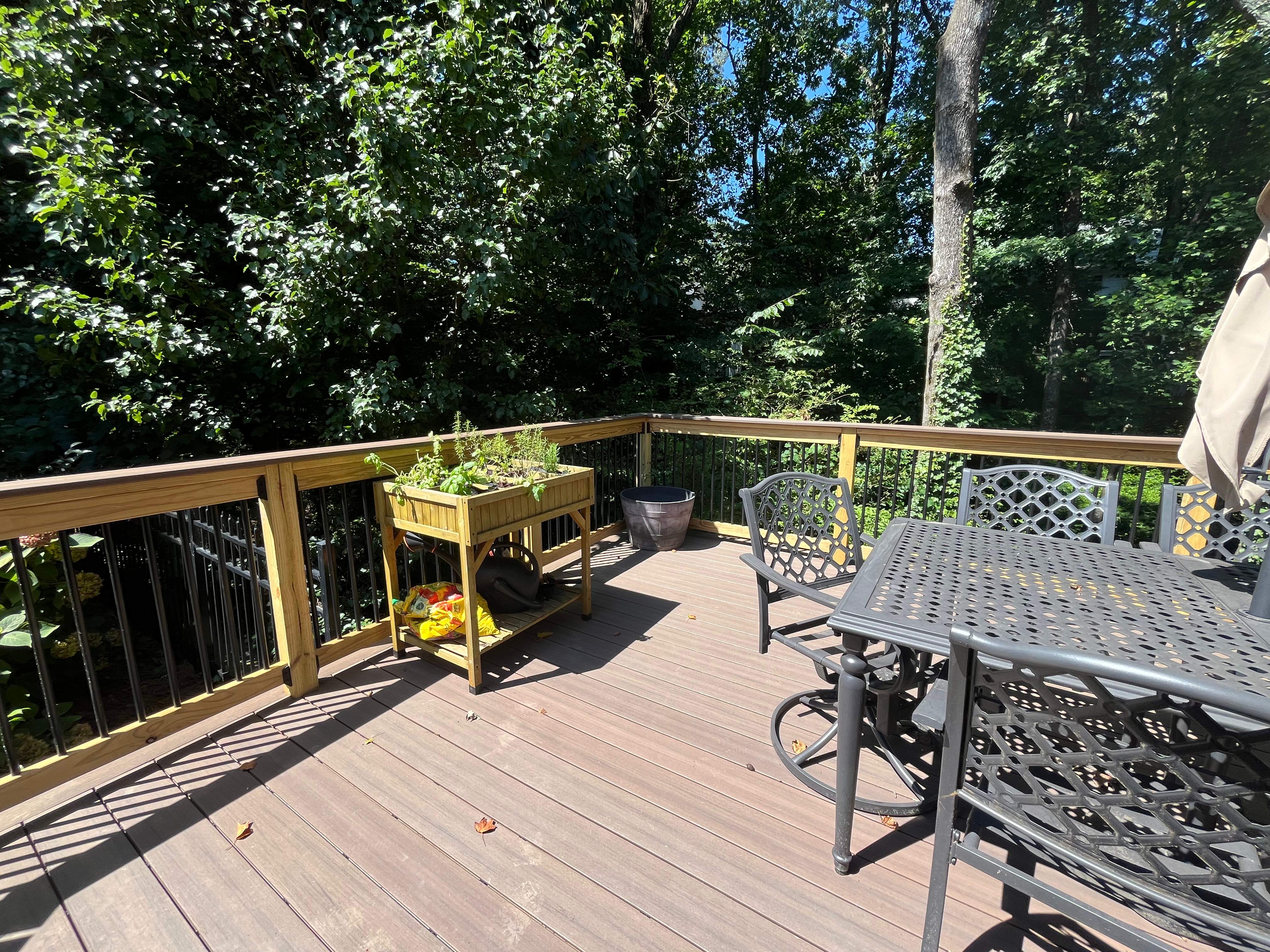 Deckorators Voyage Deck and Shed Style Covered Porch Build with Drink Rail by Nelson Exteriors 