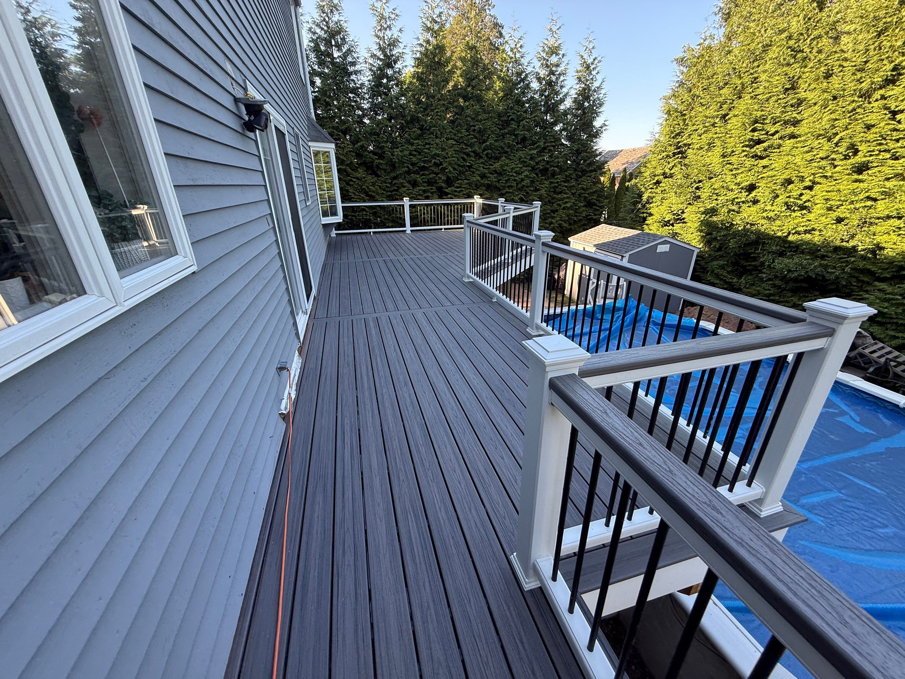 Complete replacement of original deck and addition of new pool deck by DiGiorgi Roofing and Siding Inc