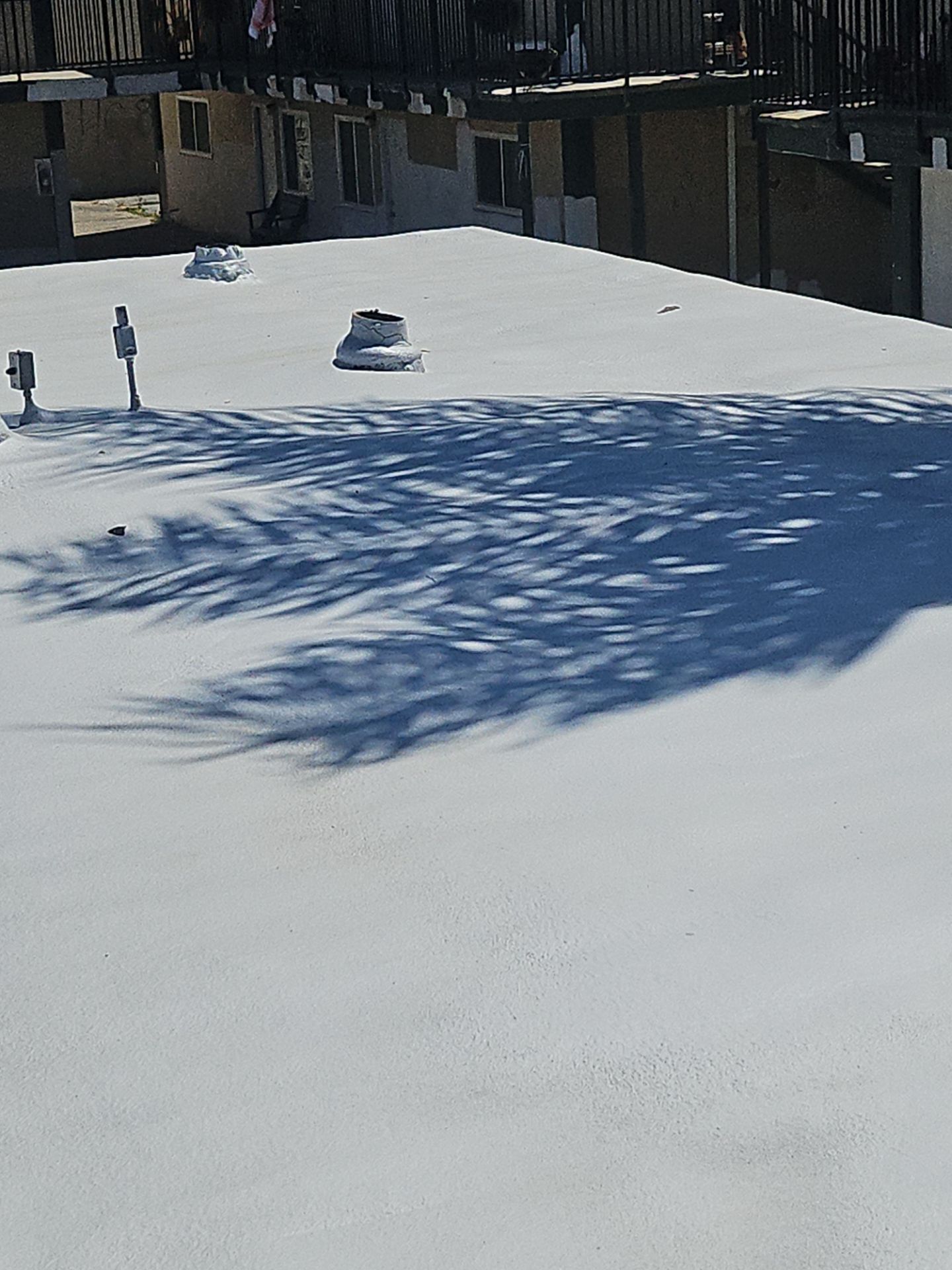 Foam Refurbish using General Coatings acrylic coatings and spray foam by Straight Edge Roofing Inc