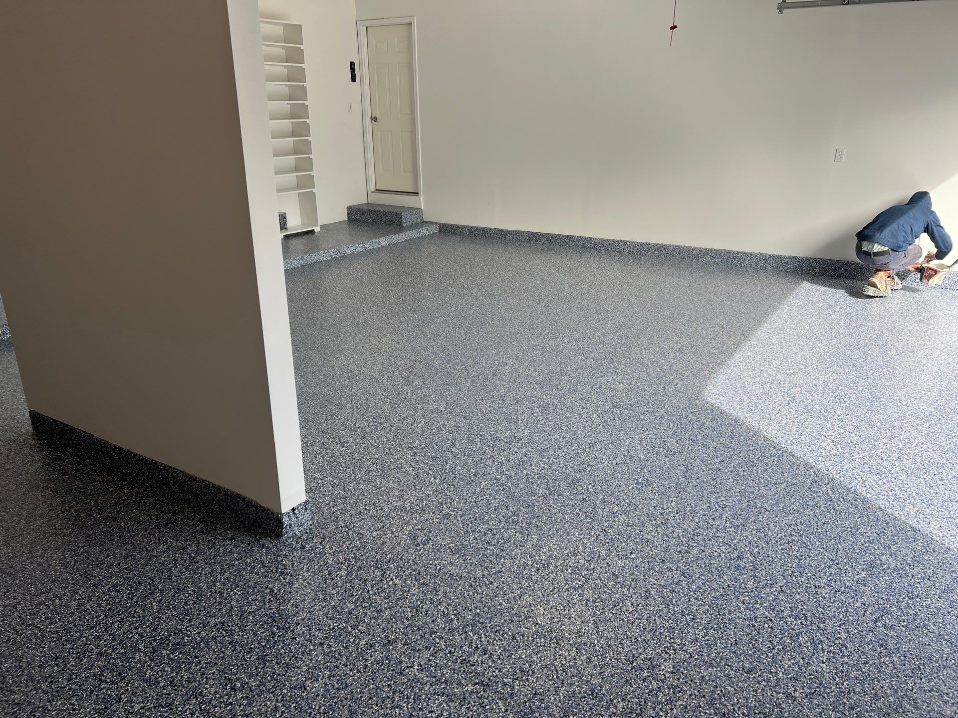 Custom Epoxy Flake Floor and Garage Wall Renovation in Ada by Gordon Painting