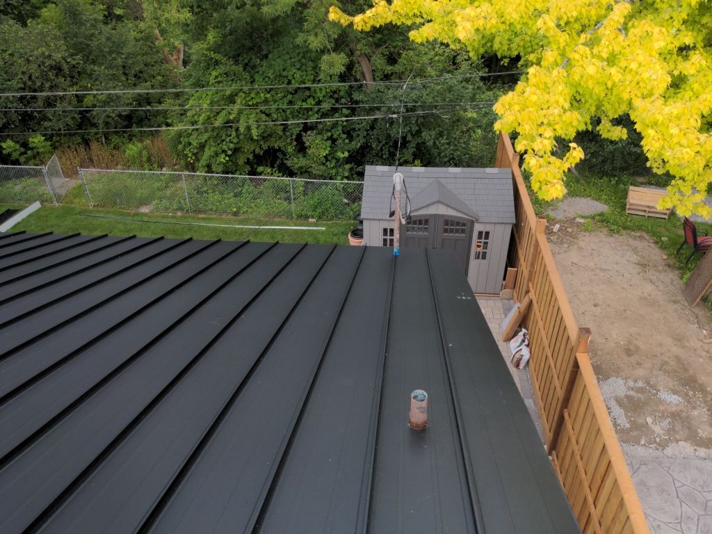 Residential Roofing Installation using 16" Standing Seam Panels by Jay Carter Roofing & Sheet Metal