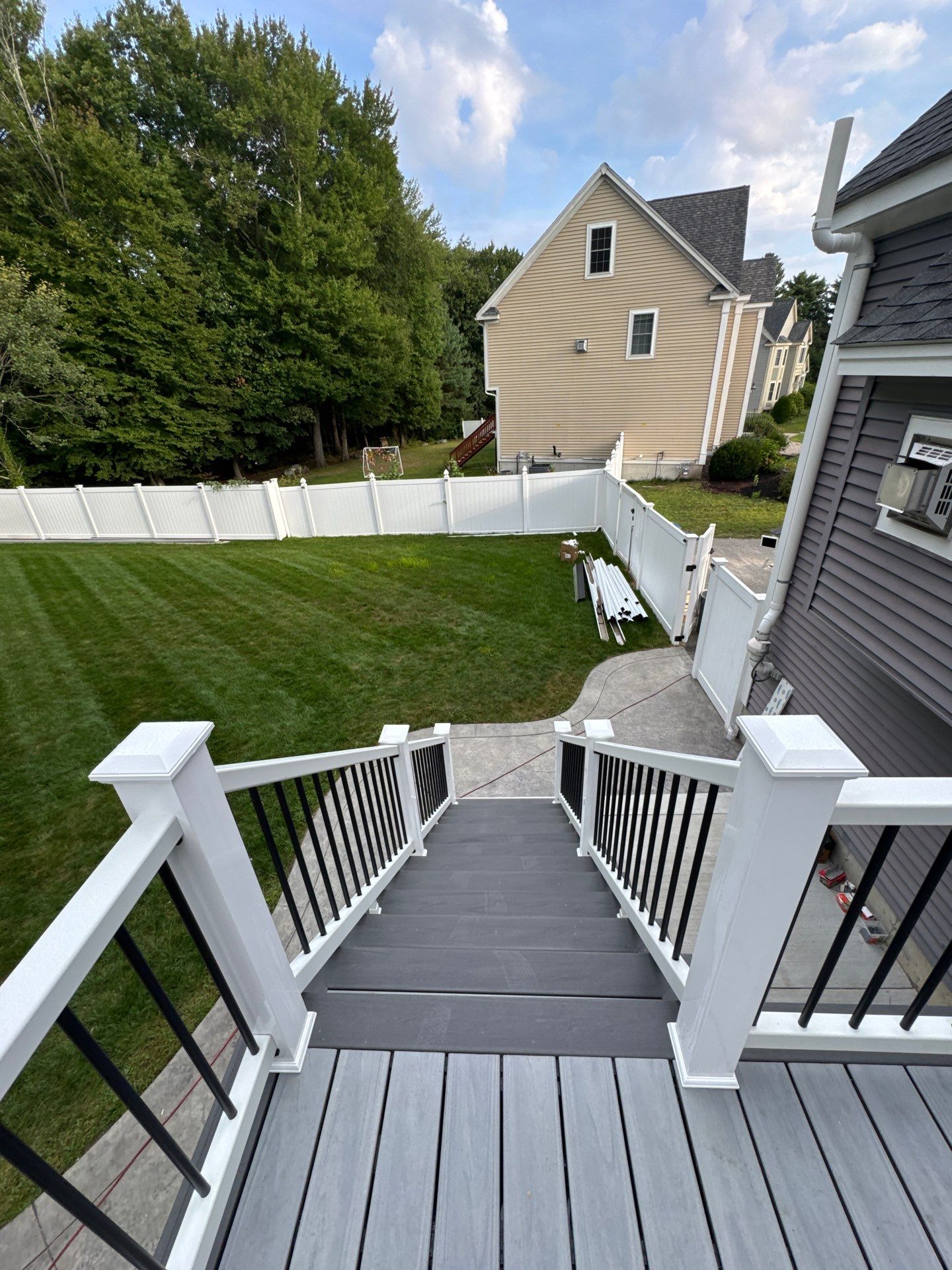Roof, Trim, Deck, and Gutter Restoration by Mighty Dog Roofing of Greater Middlesex County