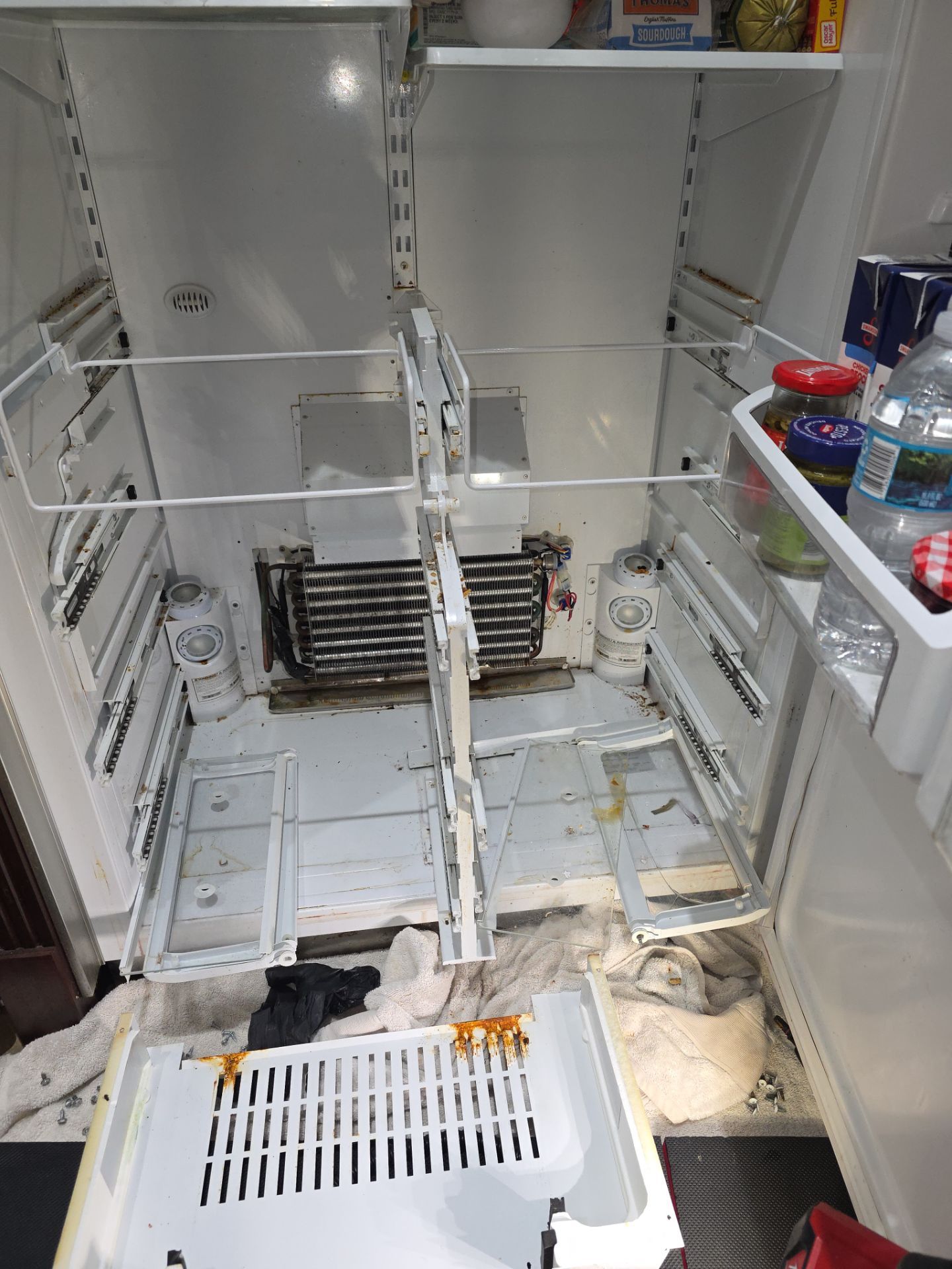 GE Monogram Built-In Refrigerator Cooling System Repair in Clermont by AMB-WORKS APPLIANCE REPAIR