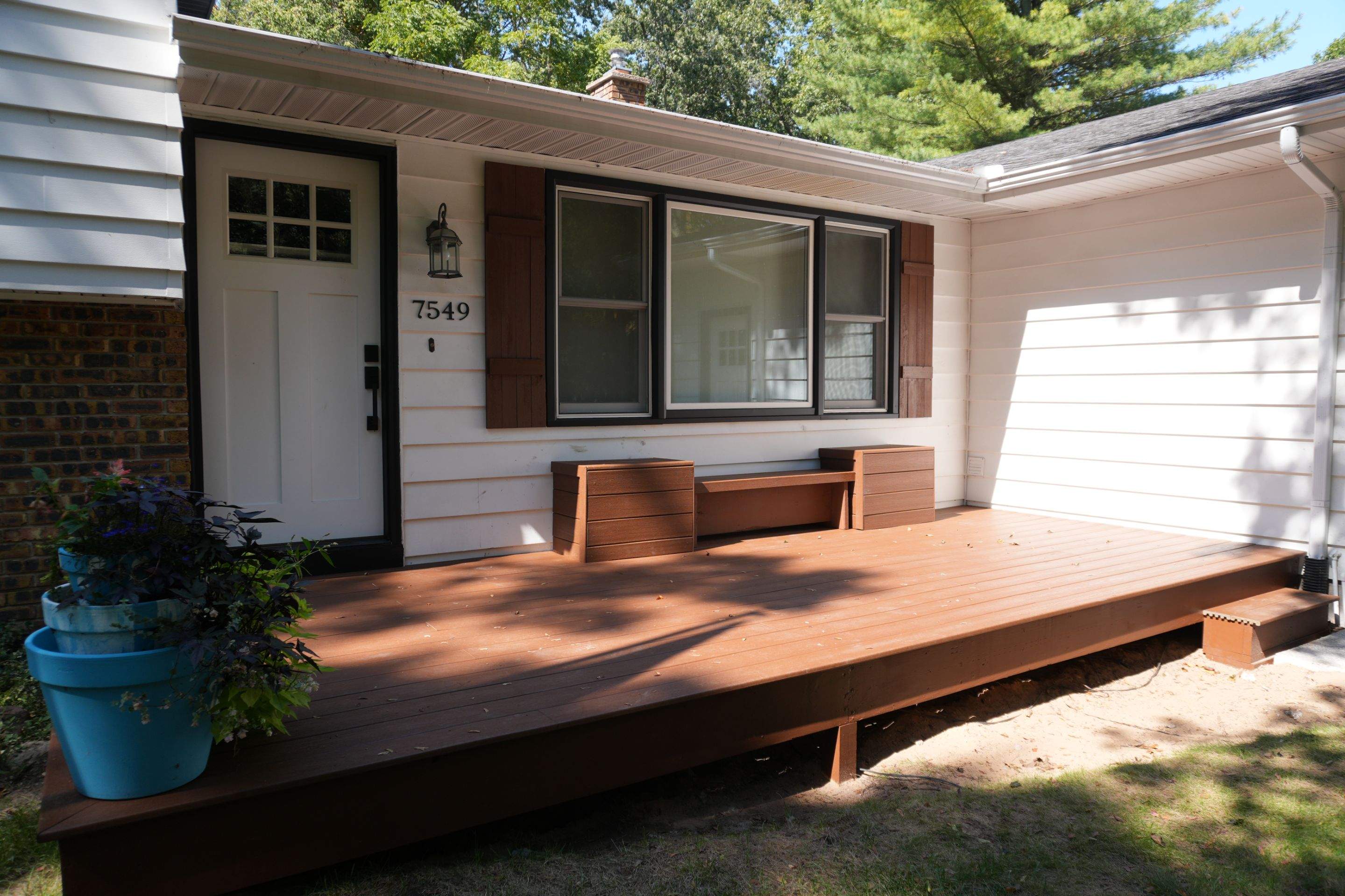 Exterior Remodel & Custom Deck by Cutting Edge Homes