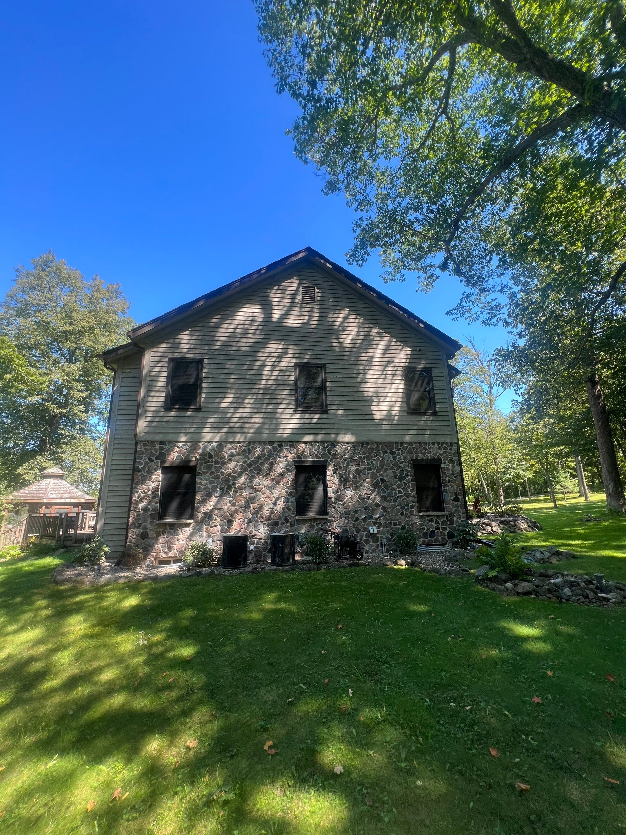 Roof Installation on Home, Garages, and Gazebo with GAF HDZ Shingles in Cedarburg, WI by Gellings Roofing & Siding
