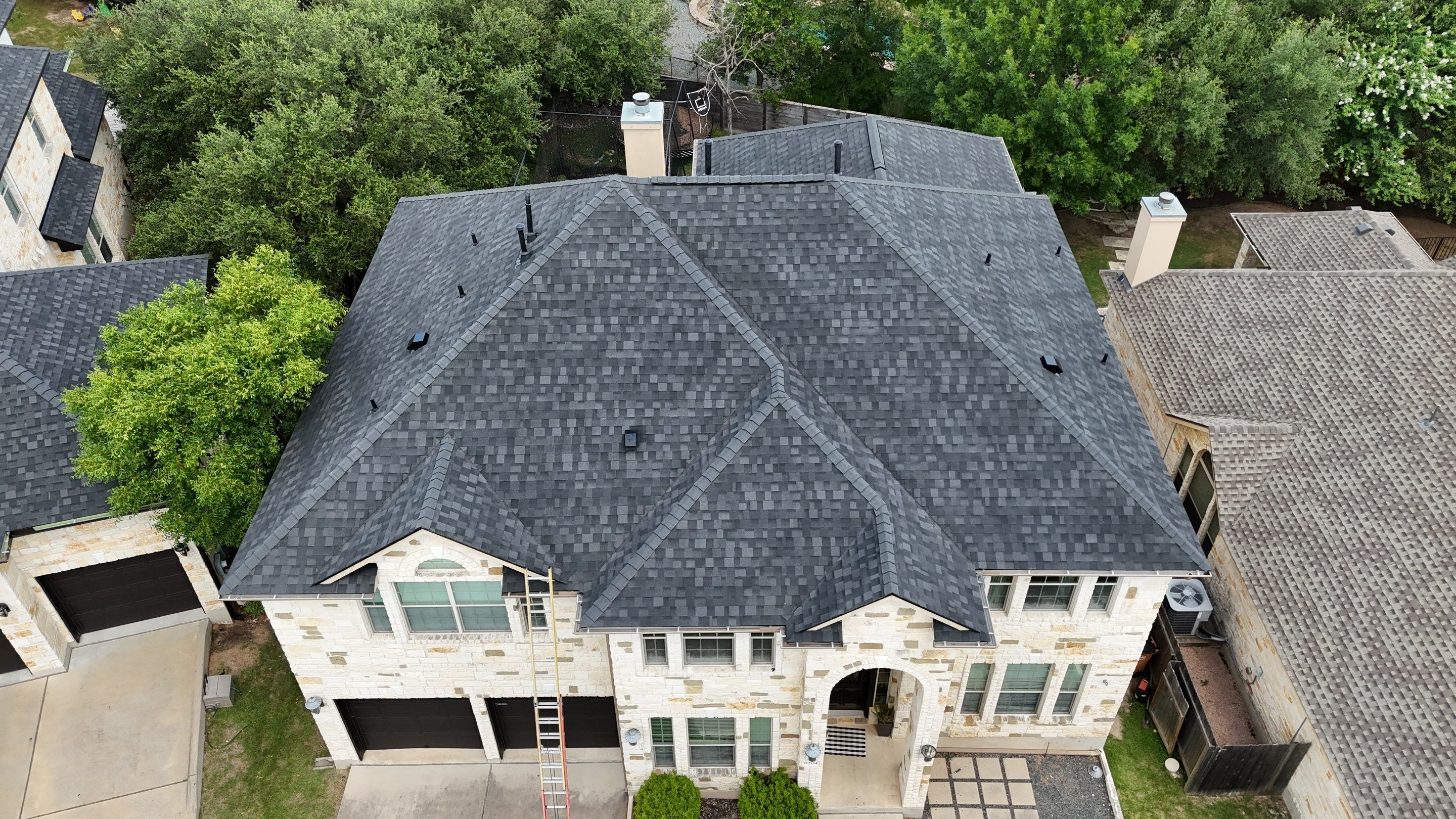 IKO Dynasty Granite Black by Perennial Roofing 