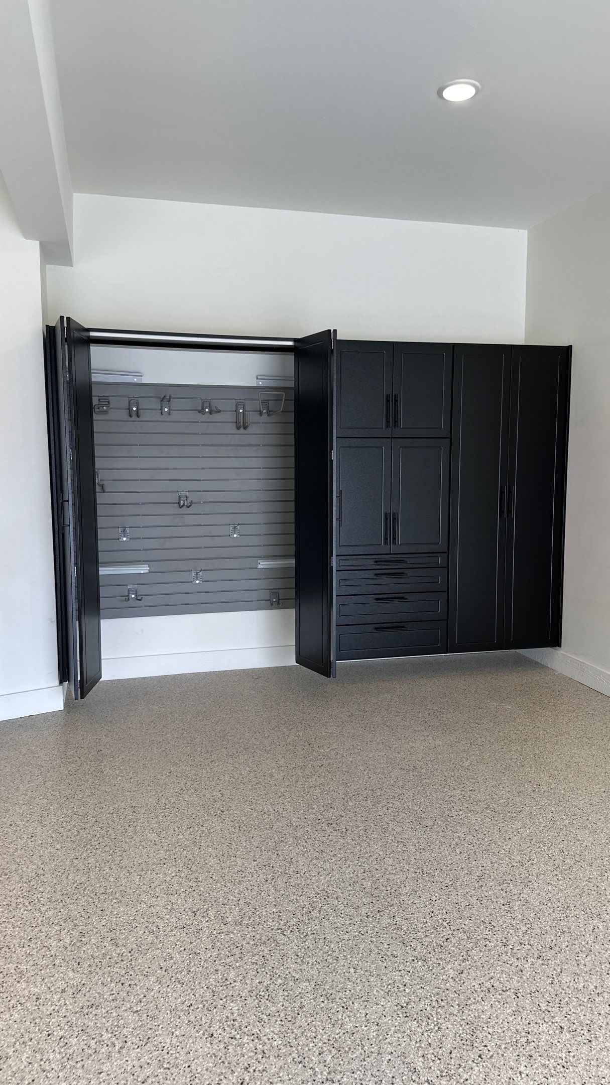 Jed W. went with Black powder coat on his cabinets.  by Banner Garage