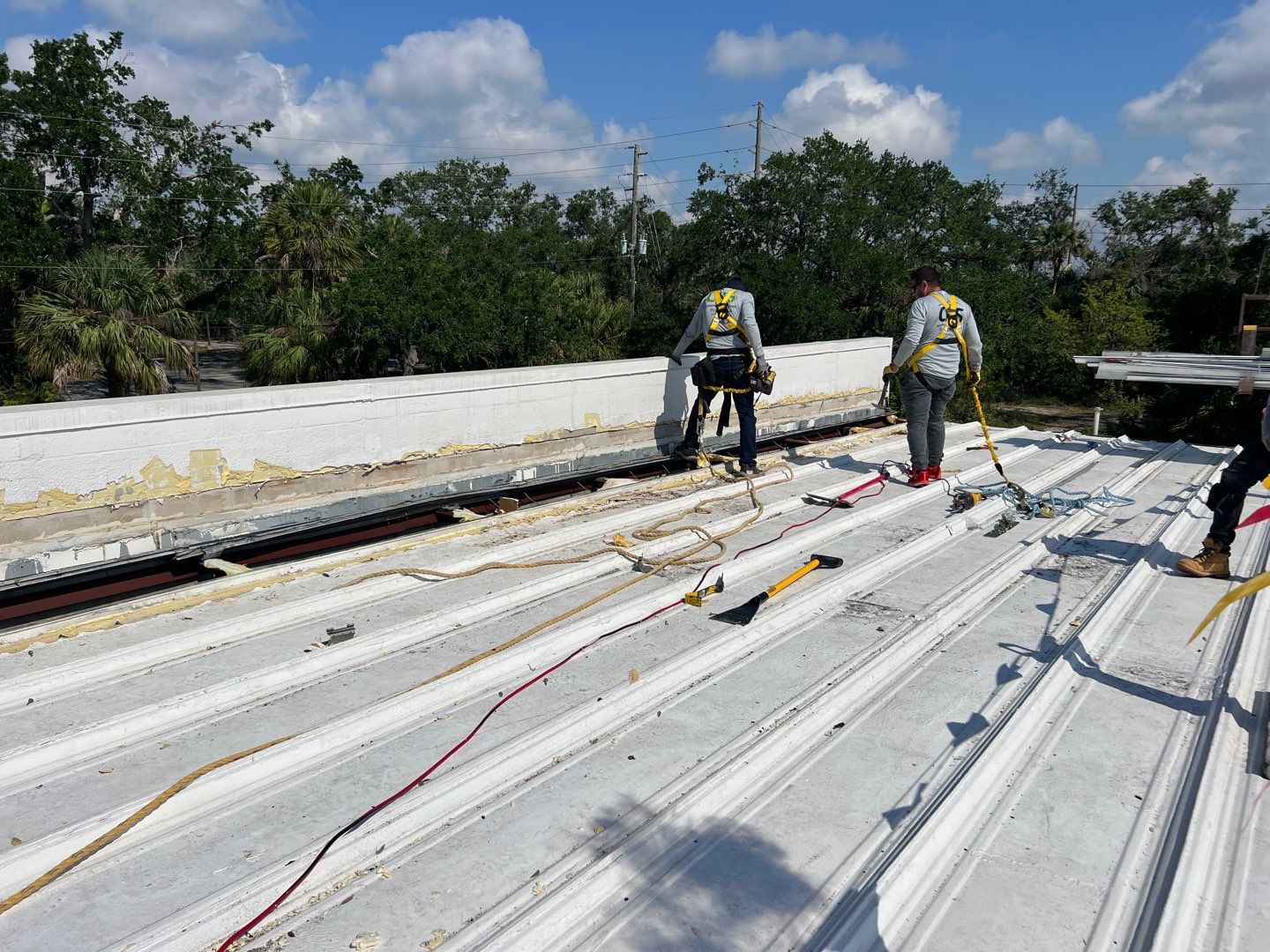 Commercial Metal Roof Replacement at Shopping Plaza in Port Charlotte by CES Roofing