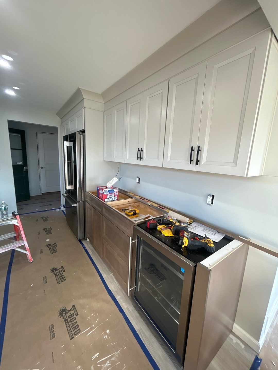 Interior Renovations, Kitchen Remodel, and Window Replacement by Ivy Lea Construction