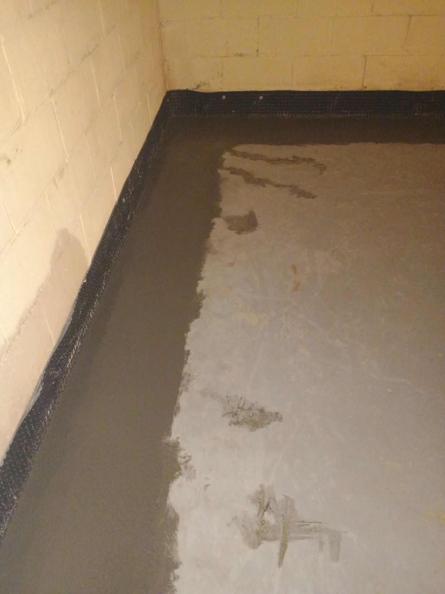 Drain Tile & Sump Pump for Kassie's Rental Property by Waterproofing Northeast