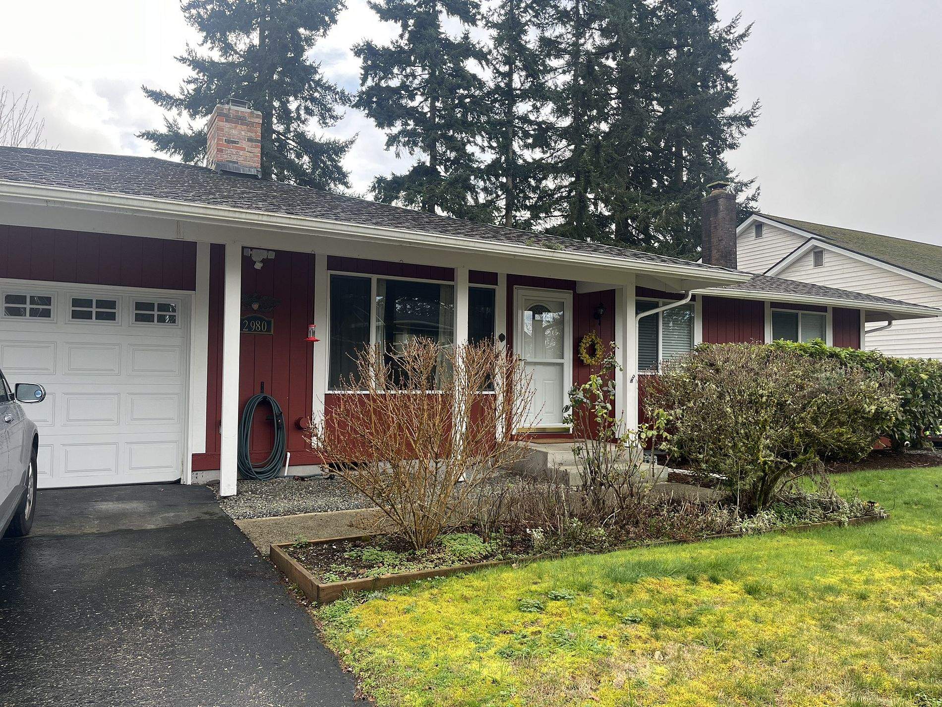Residential Roof Cleaning in Progress in Port Orchard, WA by Hanley Construction