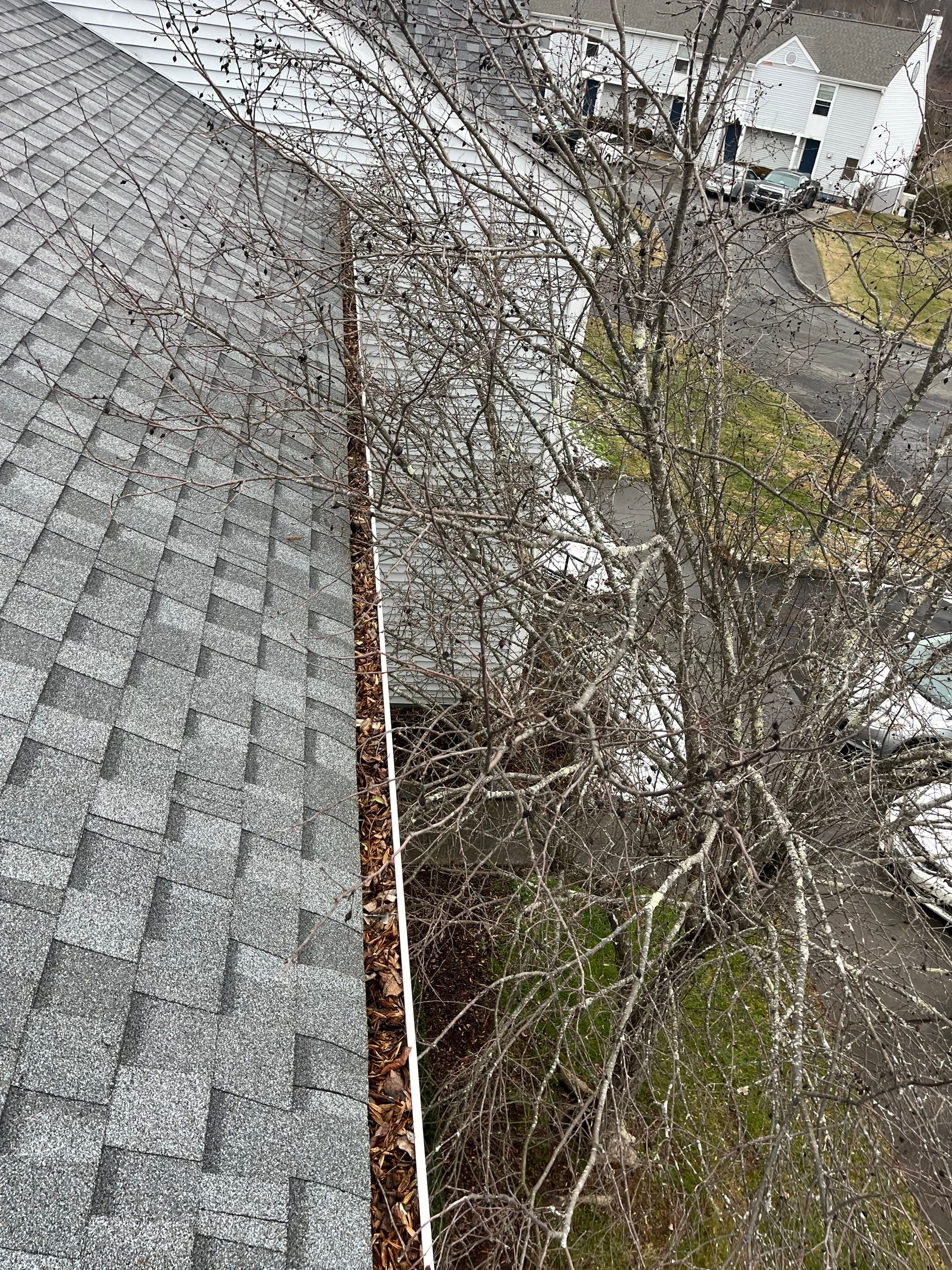 Commercial gutter cleaning Boone & Blowing Rock, NC before photo with filled gutters
