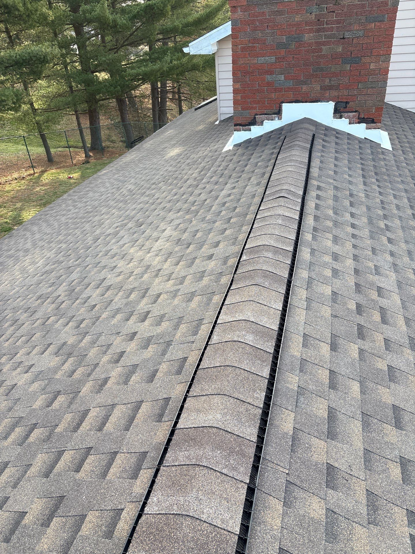 Residential Roofing Installation using GAF Timberline HDZ Charcoal by Rainstoppers Roofing