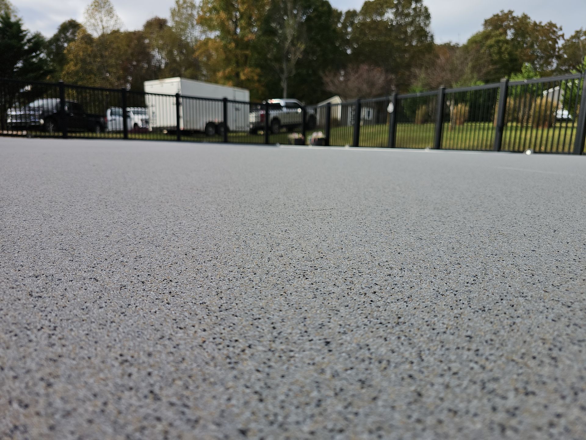 Pool Deck & Sidewalk using Quicksand & Obsidian by Elite Floor Solutions