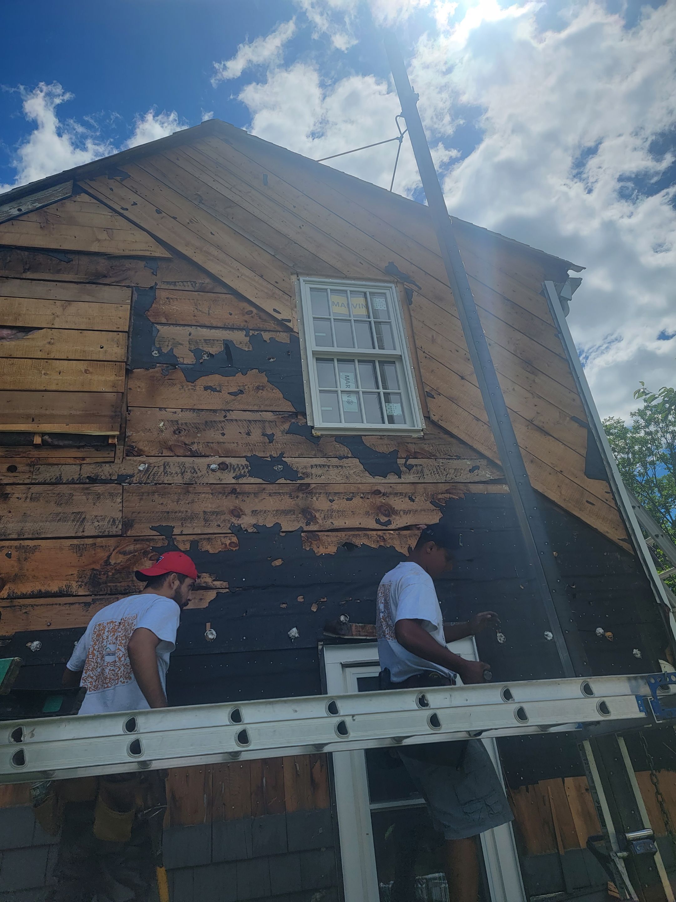 Siding Installation using James Hardie. New ThermaTru entry door and Marvin windows by UBrothers Construction