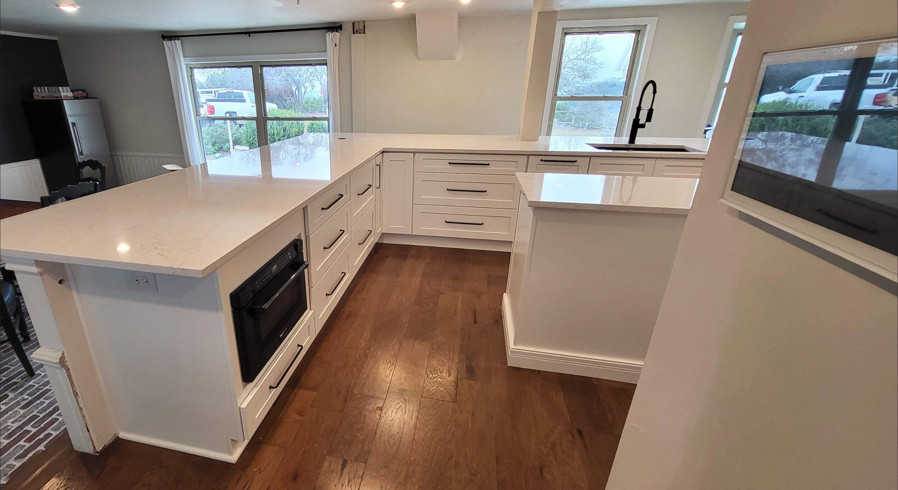 Boerne Kitchen Remodel with Quartz Countertops and White Shaker Cabinets by Legacy Bath and Kitchen