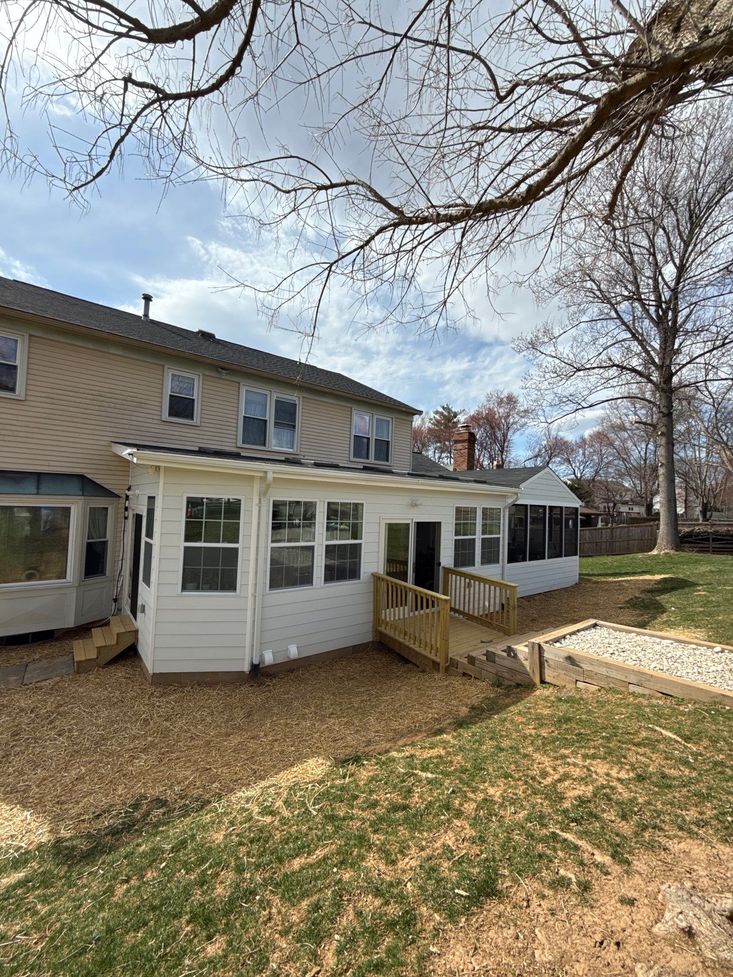 Sun room  using Concrete wood lumber, insulation , drywall, painting , cabinets , laminate floor  . by Jesus Master Handyman LLC 