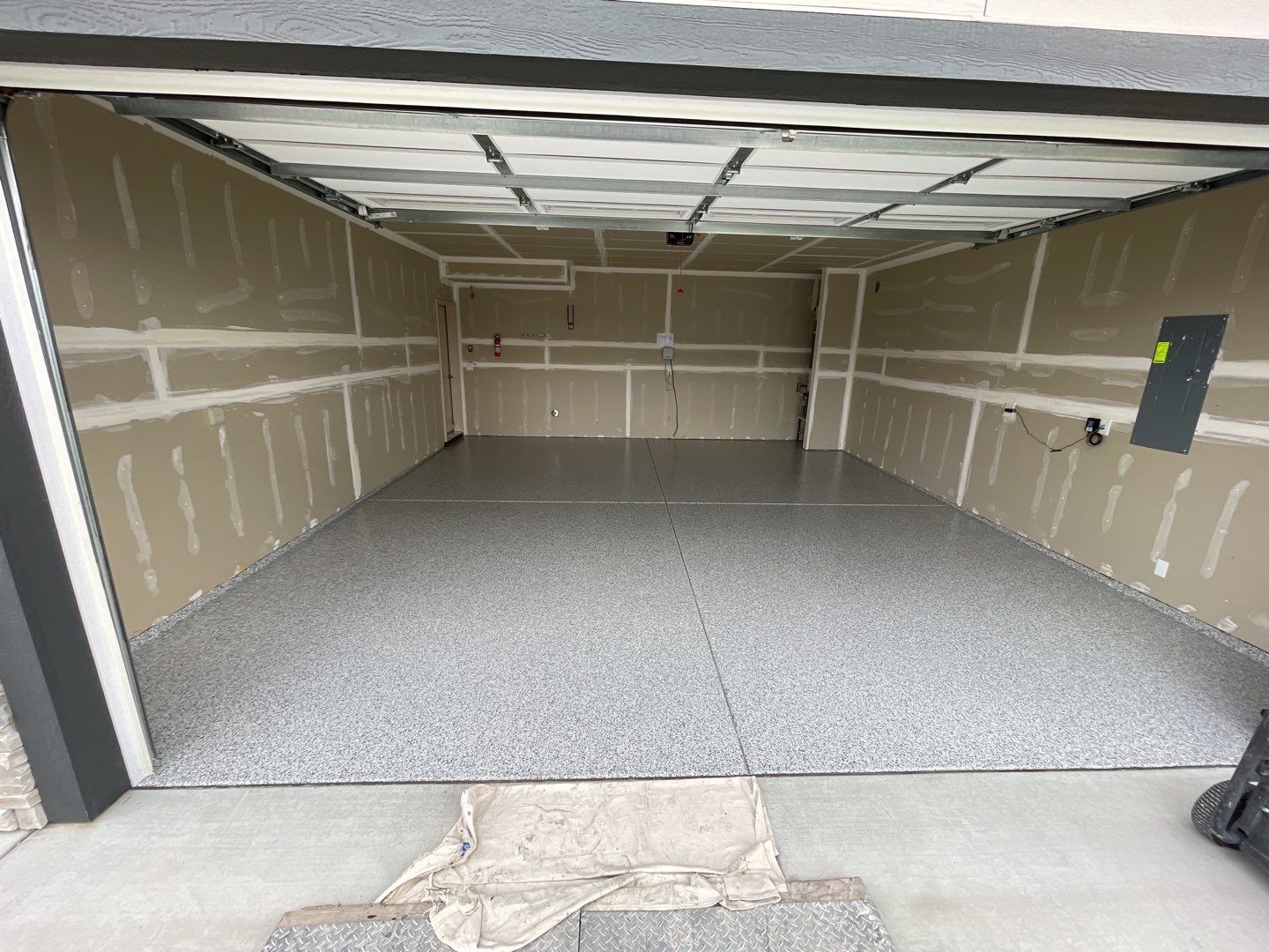 Garage Transformation using Slate Stone by Croc Coatings, LLC
