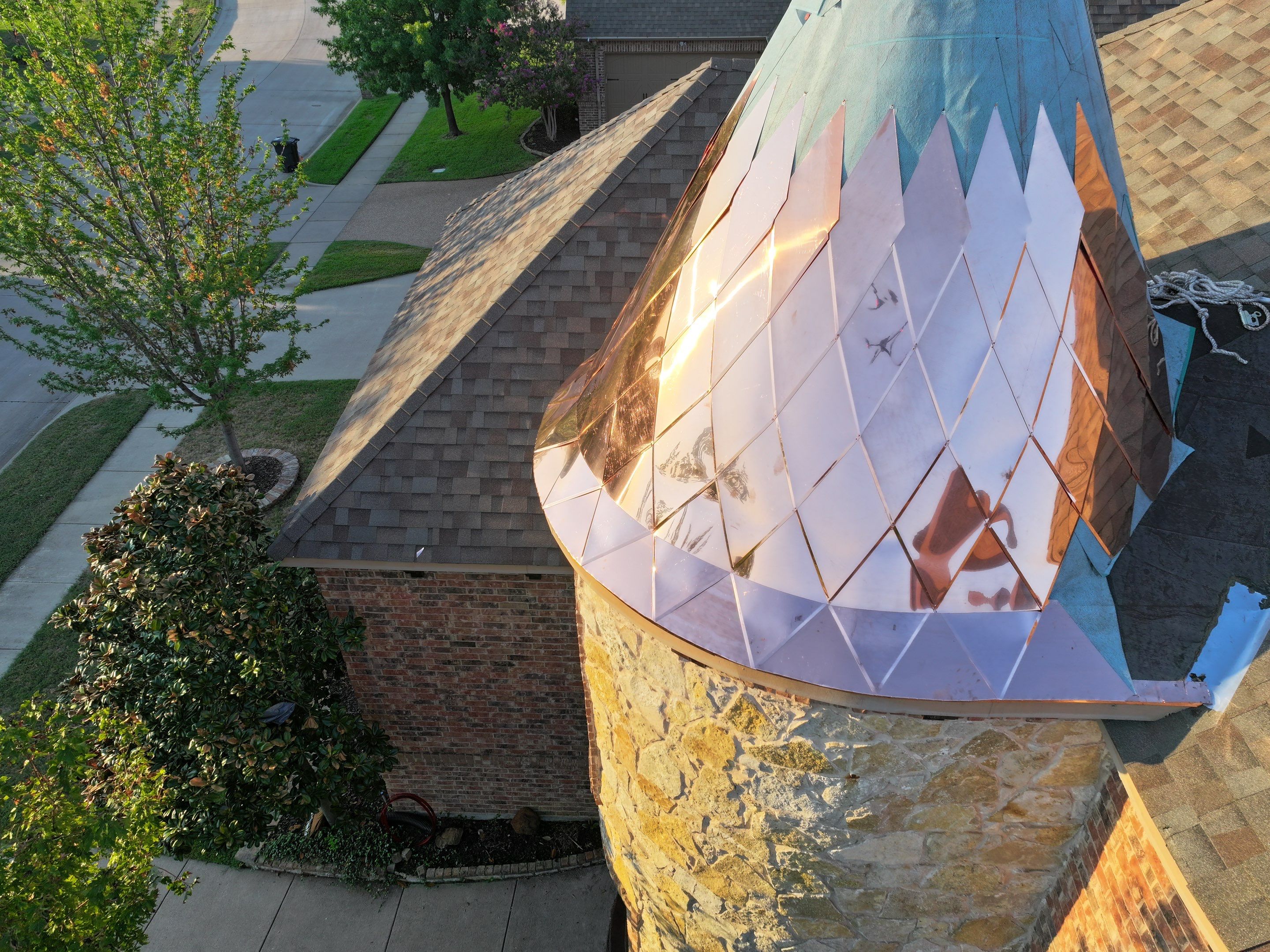 Installing Custom copper turret and Malarkey Vista Class 4 shingles Hail Damage Upgrade by Becker Roofing and Exteriors