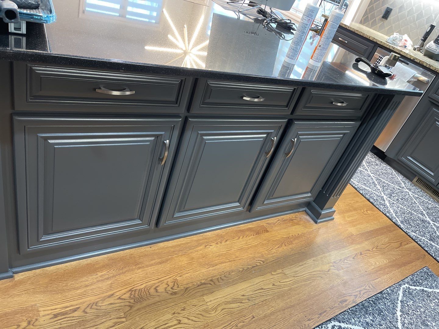 Painting Hardwood using Sherwin Williams paint by Lightning Exteriors