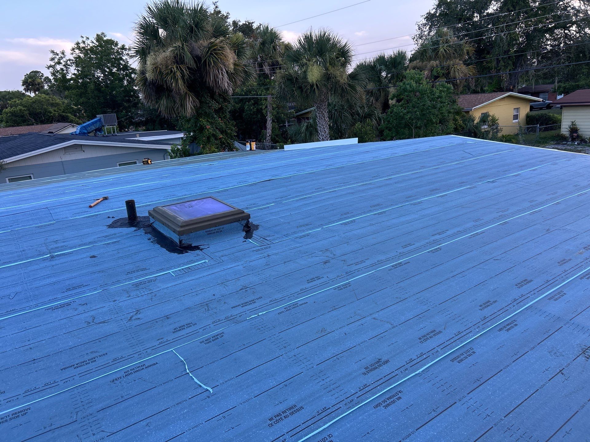 Colonial Slate Modified Bitumen Flat Roof Replacement in Daytona Beach by Pinnacle Roofing Group