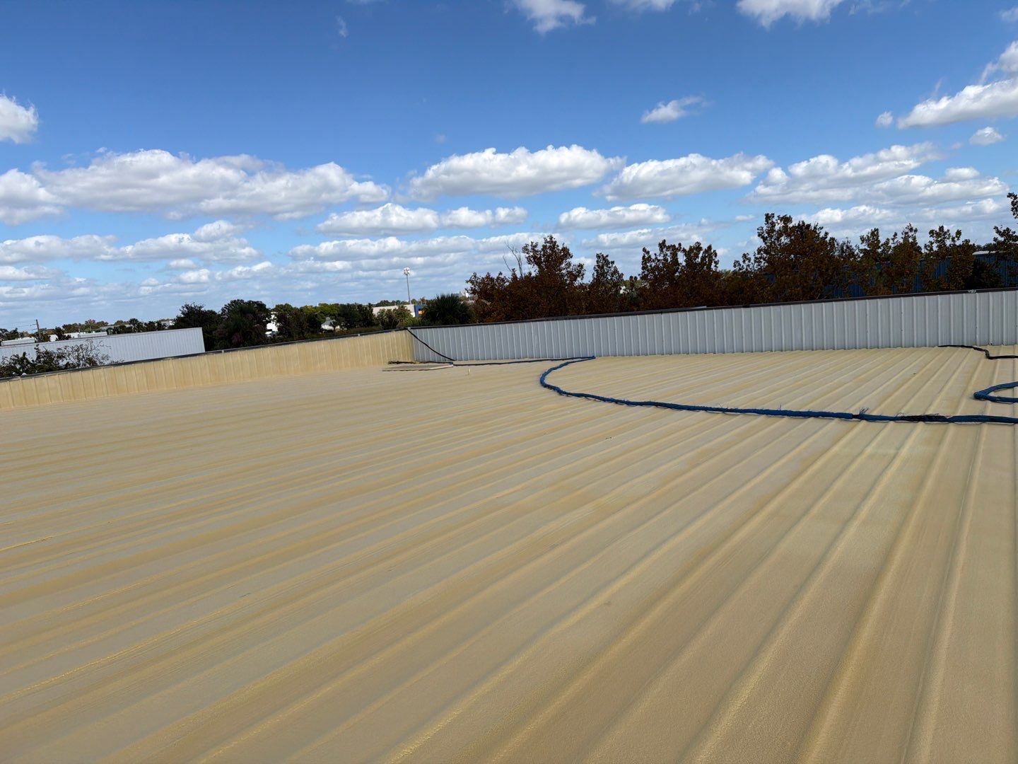 Orlando Commercial Metal Roof Restoration and Silicone Coating System by CES Roofing
