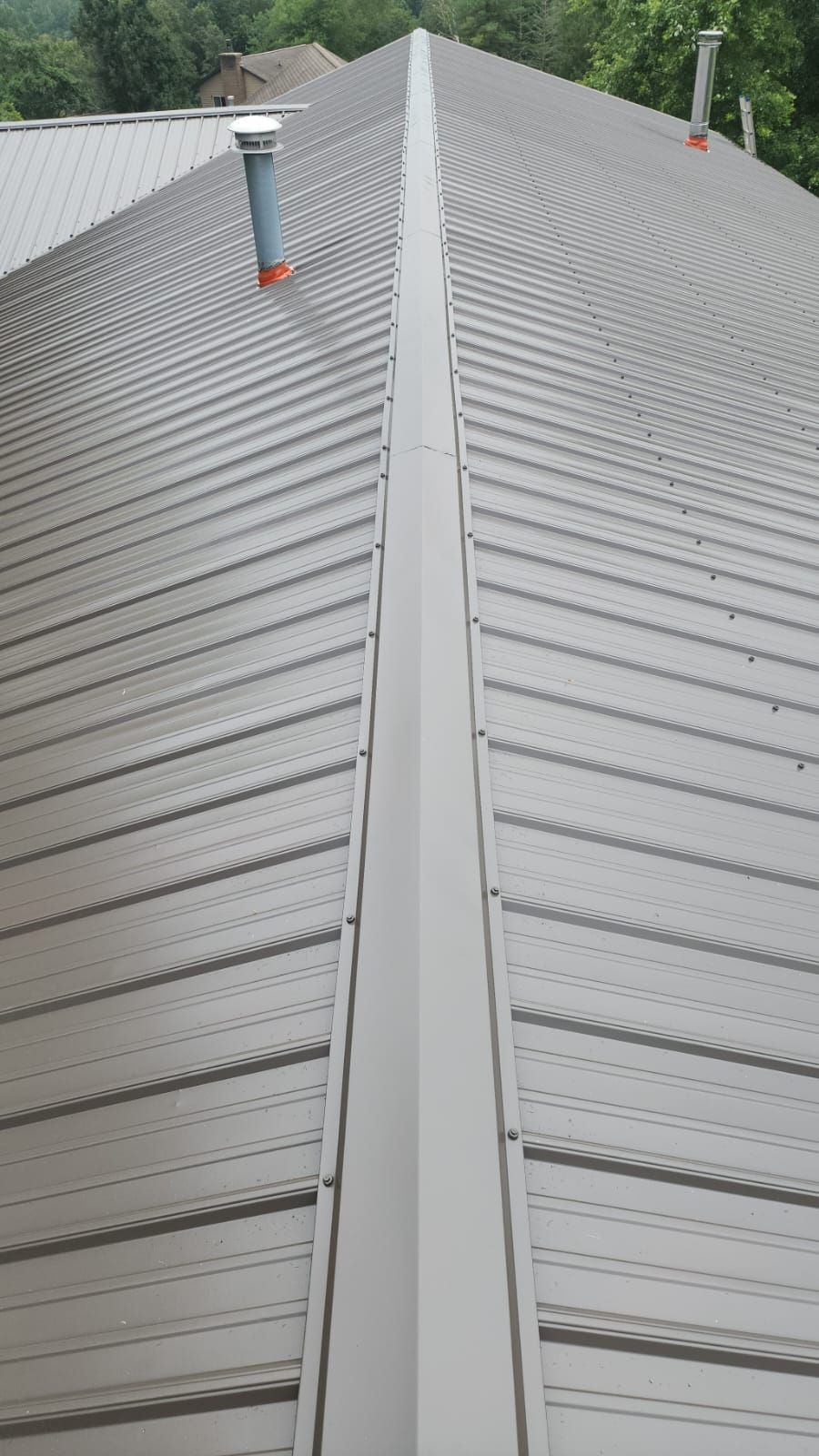 Residential Roofing Installation using Metal by Rainstoppers Roofing