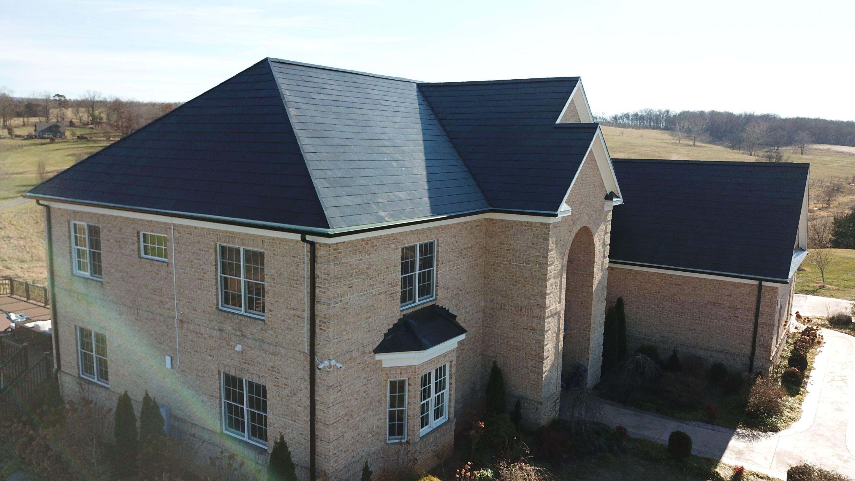 Tesla Solar Roof Replacement  by American Home Contractors