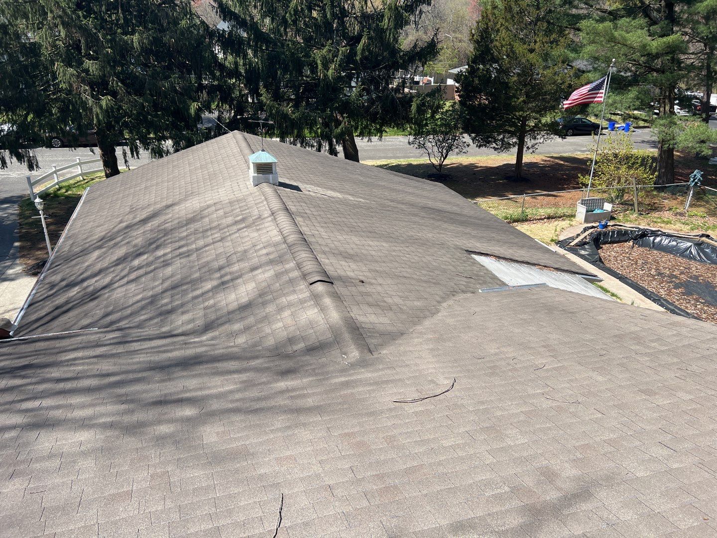 Residential Roofing Installation using GAF Timberline HDZ Weathered Wood by Mastercraft Exteriors 