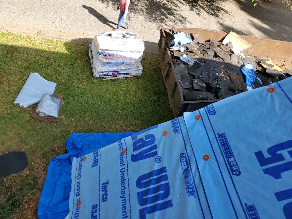 Residential Roofing Installation using Roof Replacement by American Roofing & Construction LLC