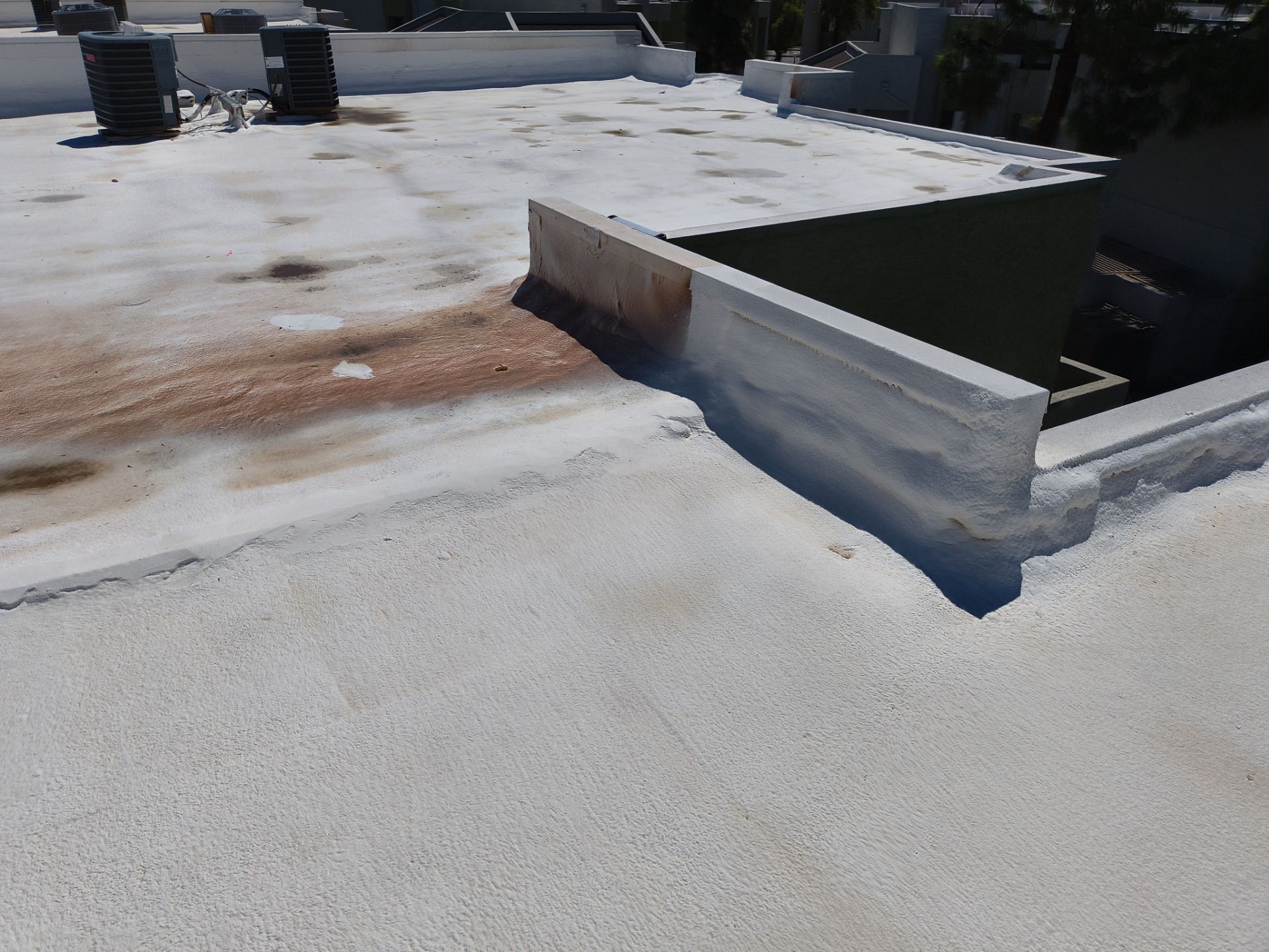 Mesa Apartment Flat Roof Coating and Interior Restoration Services by APM Builders LLC