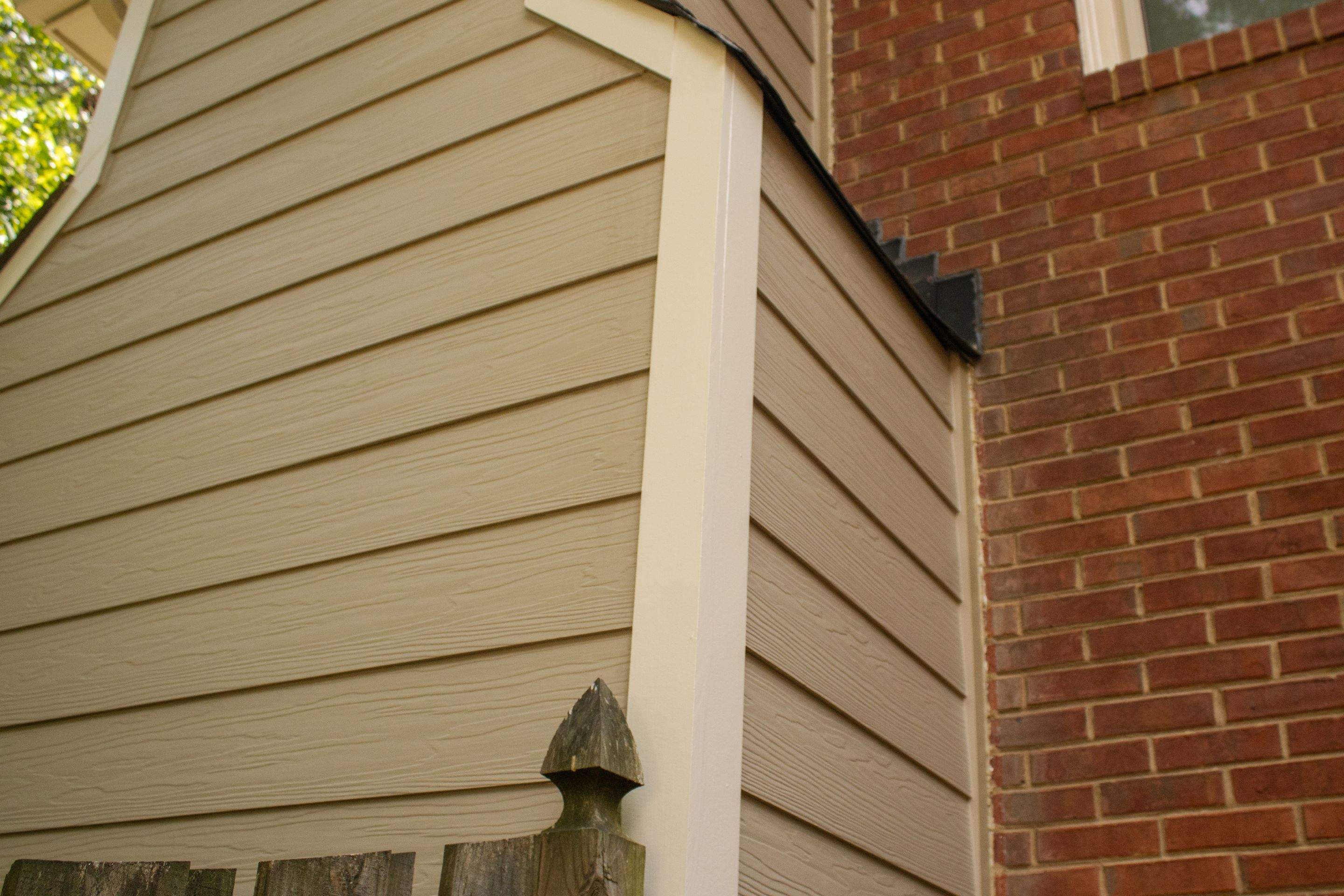 Marietta, GA Rotten Wood Replacement, Chimney Corner Board Installation, Gutter Replacement, and Exterior Painting by Nelson Exteriors
