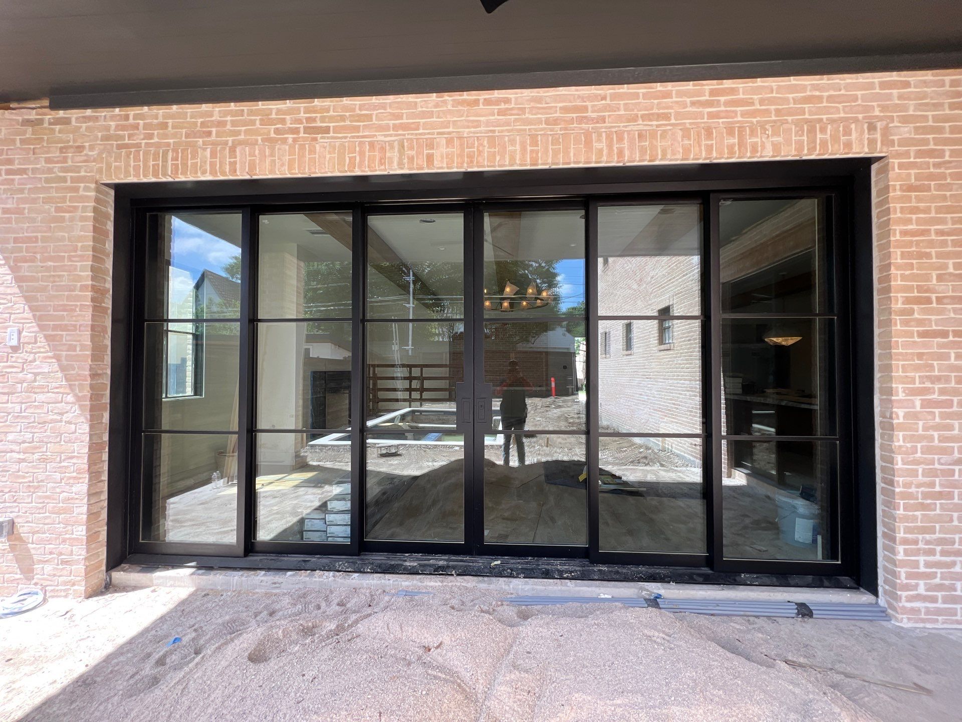 Custom 6-Panel Bi-Parting Sliding Pocket Door Installation in Dallas by Solara Custom Living