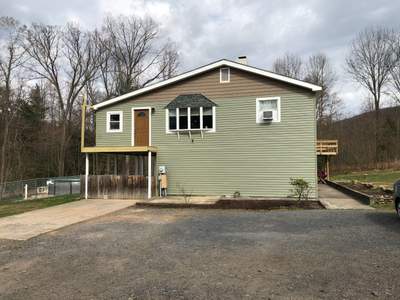 Sage Green Vinyl Siding and Exterior Trim Replacement in Ashland