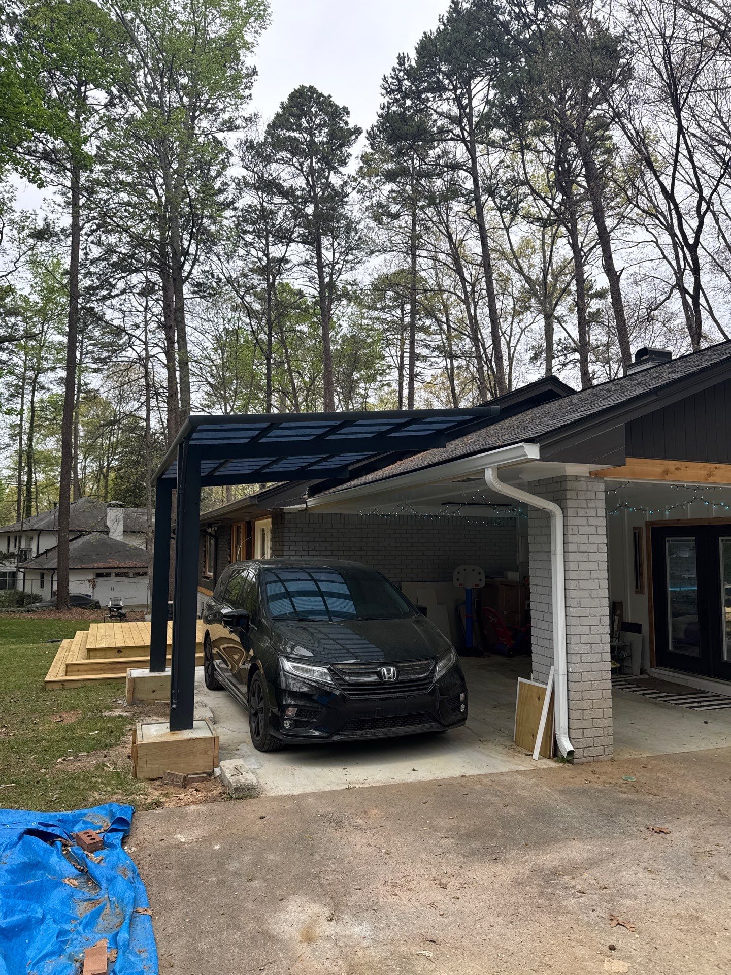 Modern Exterior Transformation and Multi-Tiered Deck Installation in Decatur by Swift Home Renovations