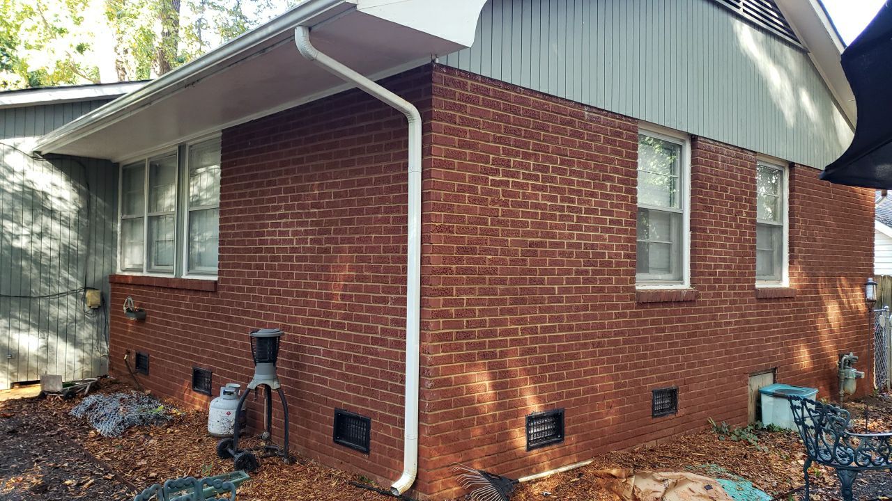 House Wash using cleaner by Power Wash Masters LLC