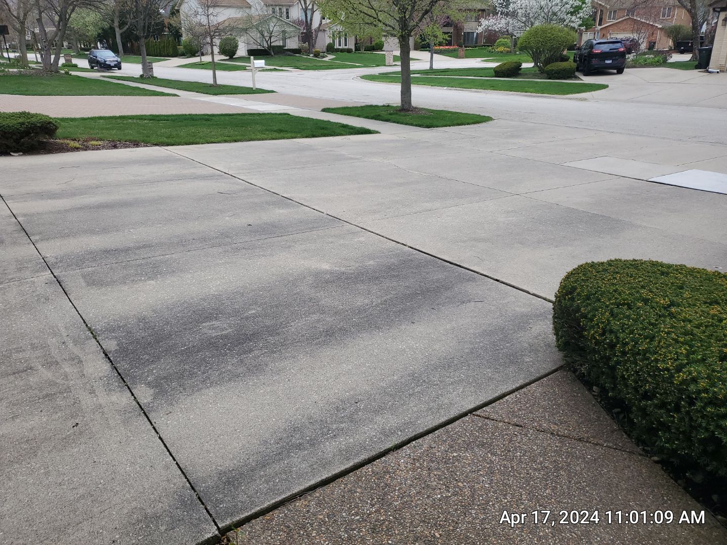 concrete patio and driveway cleaning by Northern Power Washing LLC.