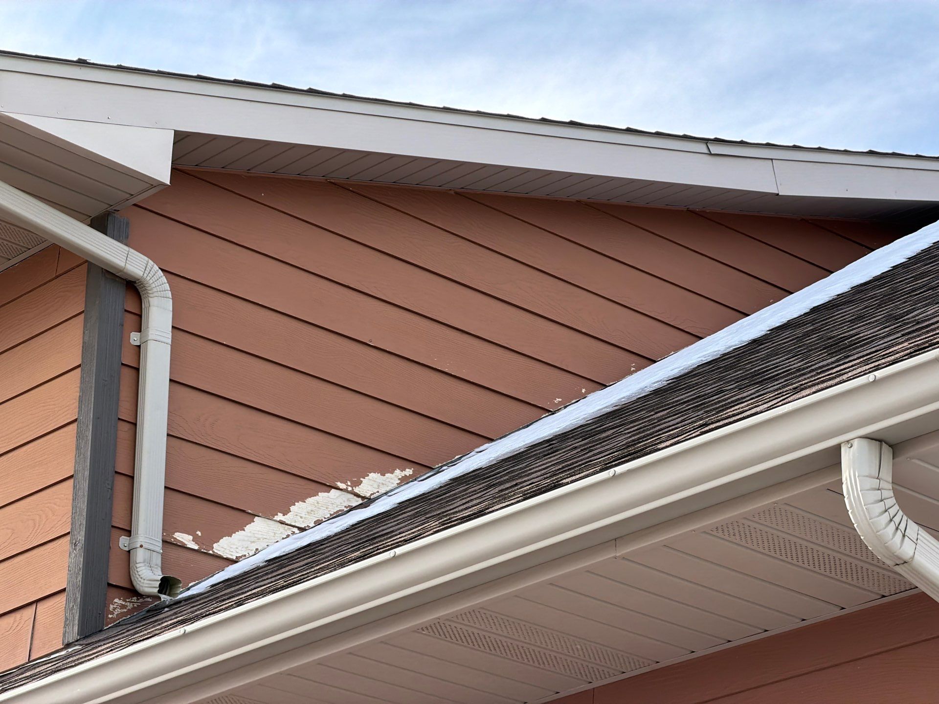 Residential Exterior Painting and Siding Restoration in Crooks by Select Painting, Coatings & Garage Cabinets