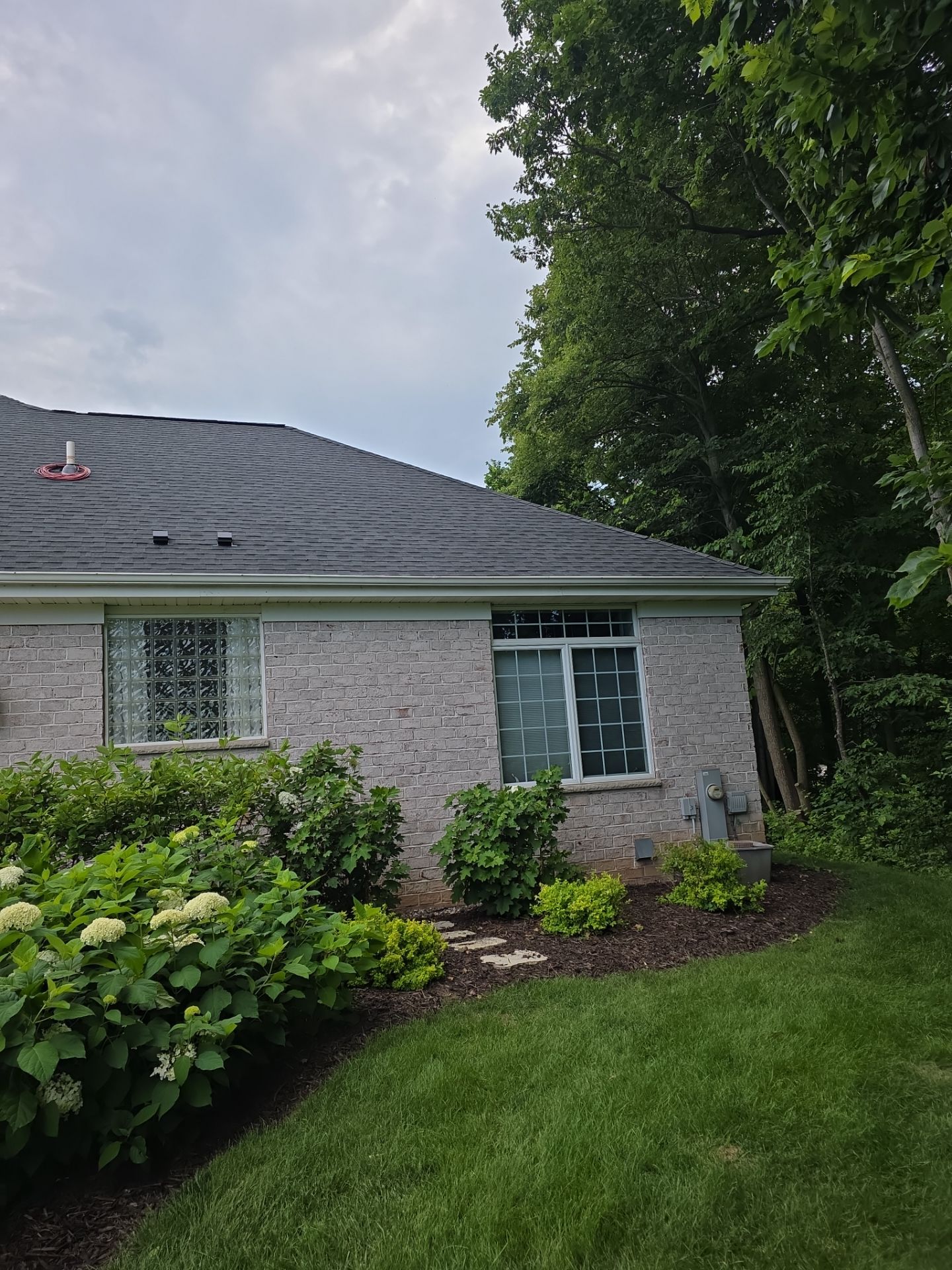 Classic Stucco Beauty  by Gellings Roofing & Siding