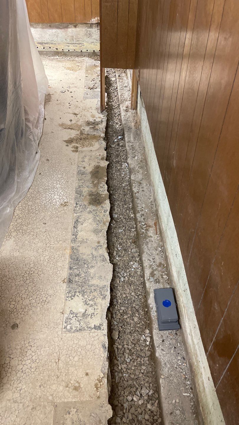 Interior Waterproofing Using GrateDrain™ Products by Toledo Basement Repair 