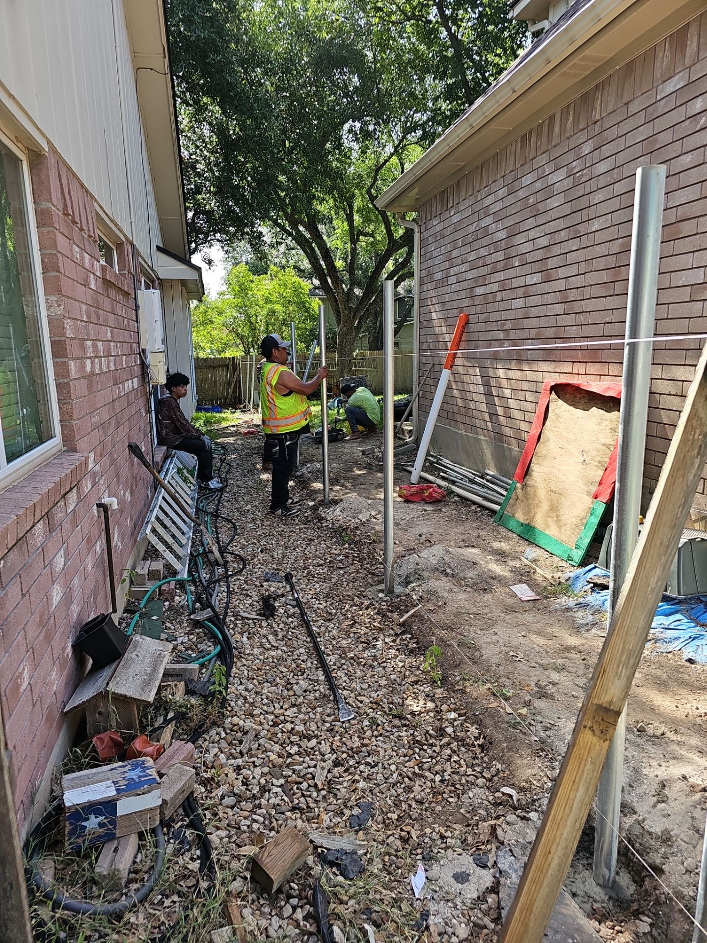 Fence Installation using Cedar Pickets by DeZign Roofing & Exteriors