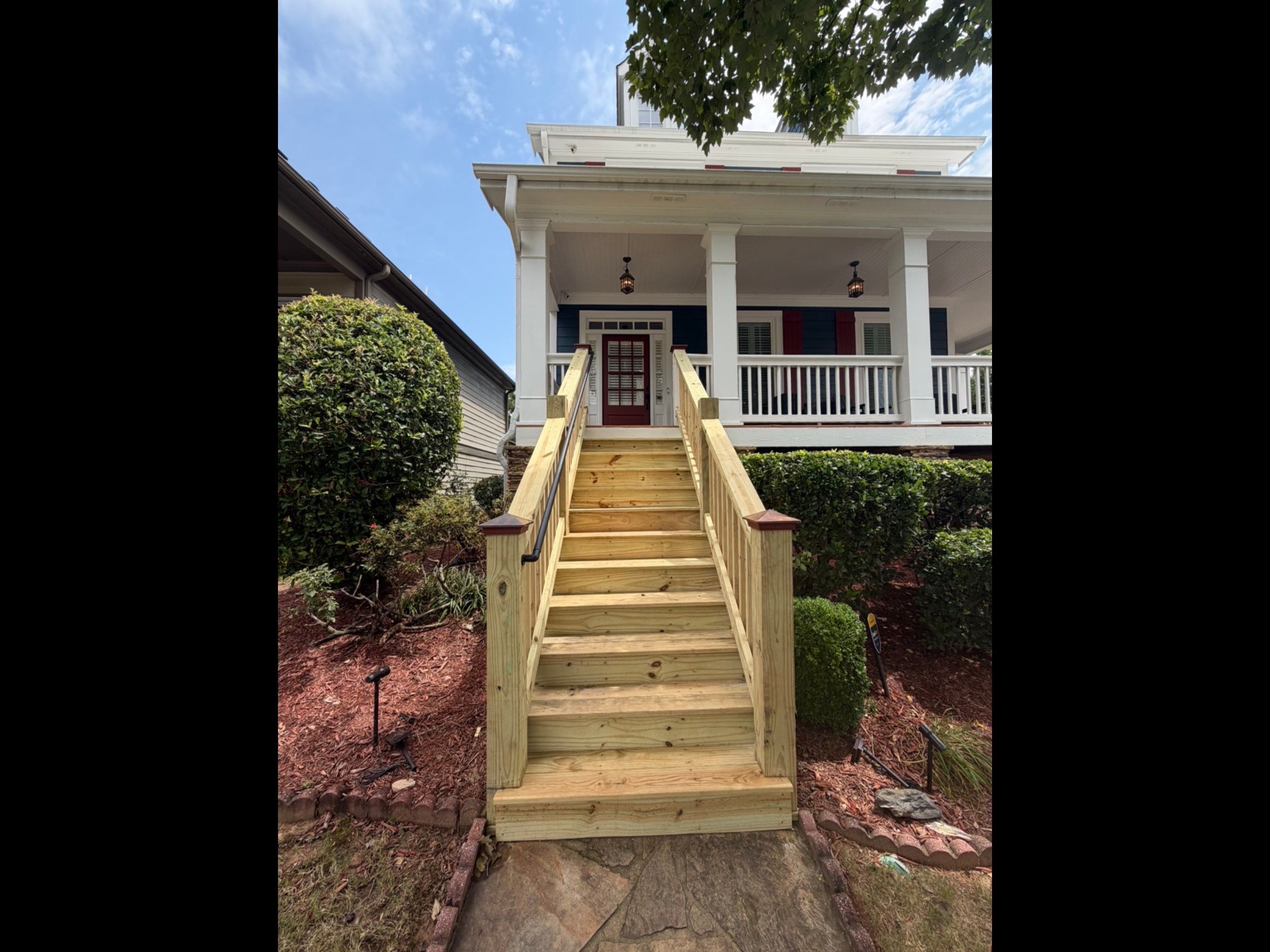 Pressure-Treated Wood Front Porch Stair Reconstruction in Atlanta by Swift Home Renovations