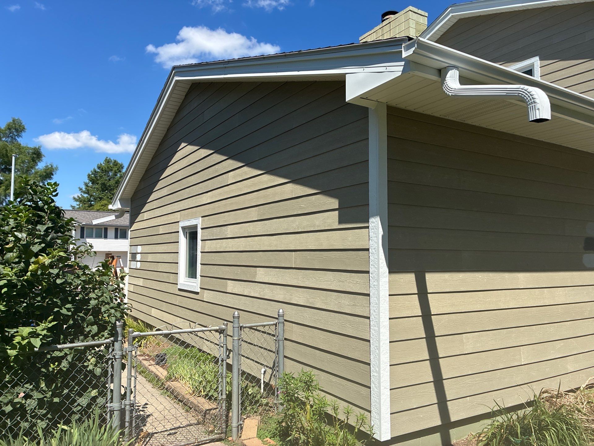 Full James Hardie Siding Replacement and Custom Exterior Paint in Papillion by Carps Complete Exteriors 