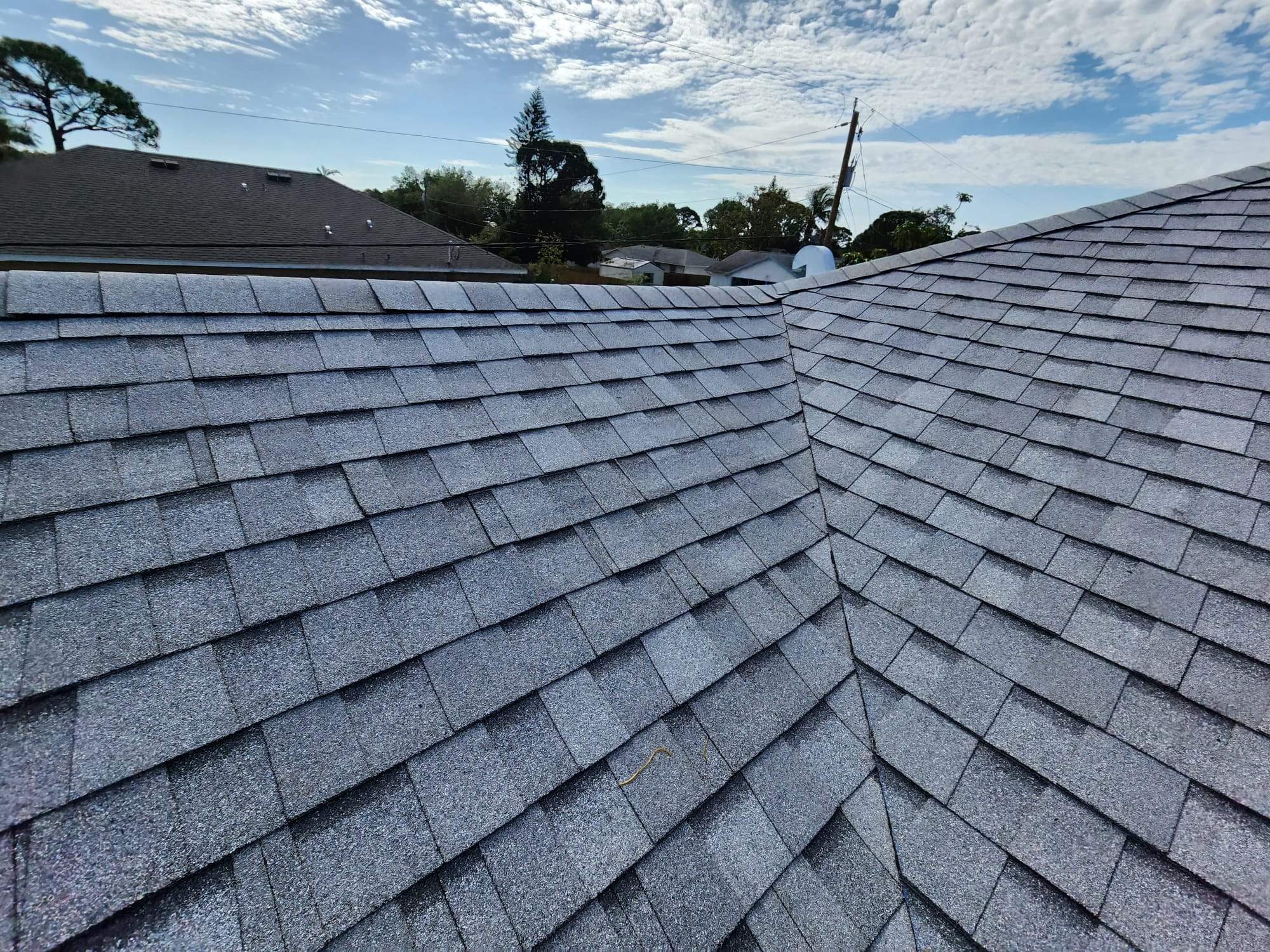 Tamko Heritage Glacier White by Total Roofing System The Metal Roof Experts