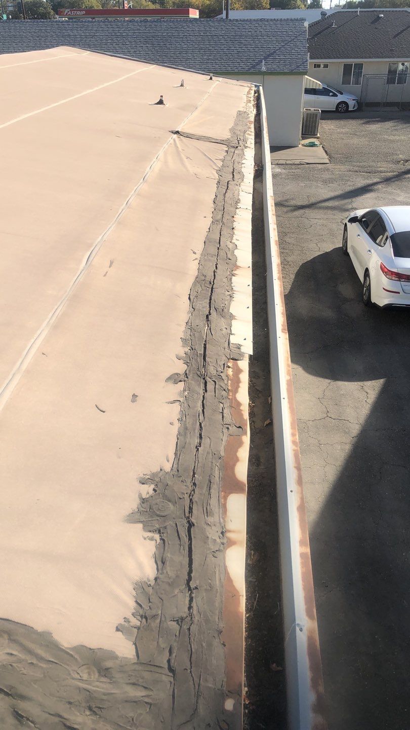 Spray foam and coatings using Conklin Benchmark/PUMA XL coatings and spray foam by Straight Edge Roofing Inc